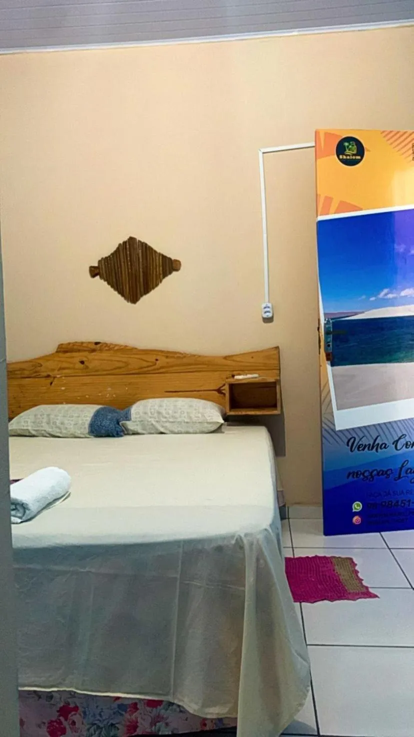 Bed in Pousada Shalom