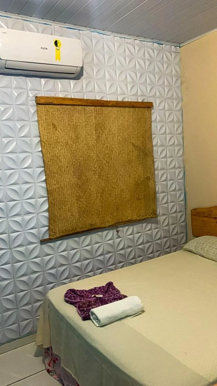 Bed in Pousada Shalom