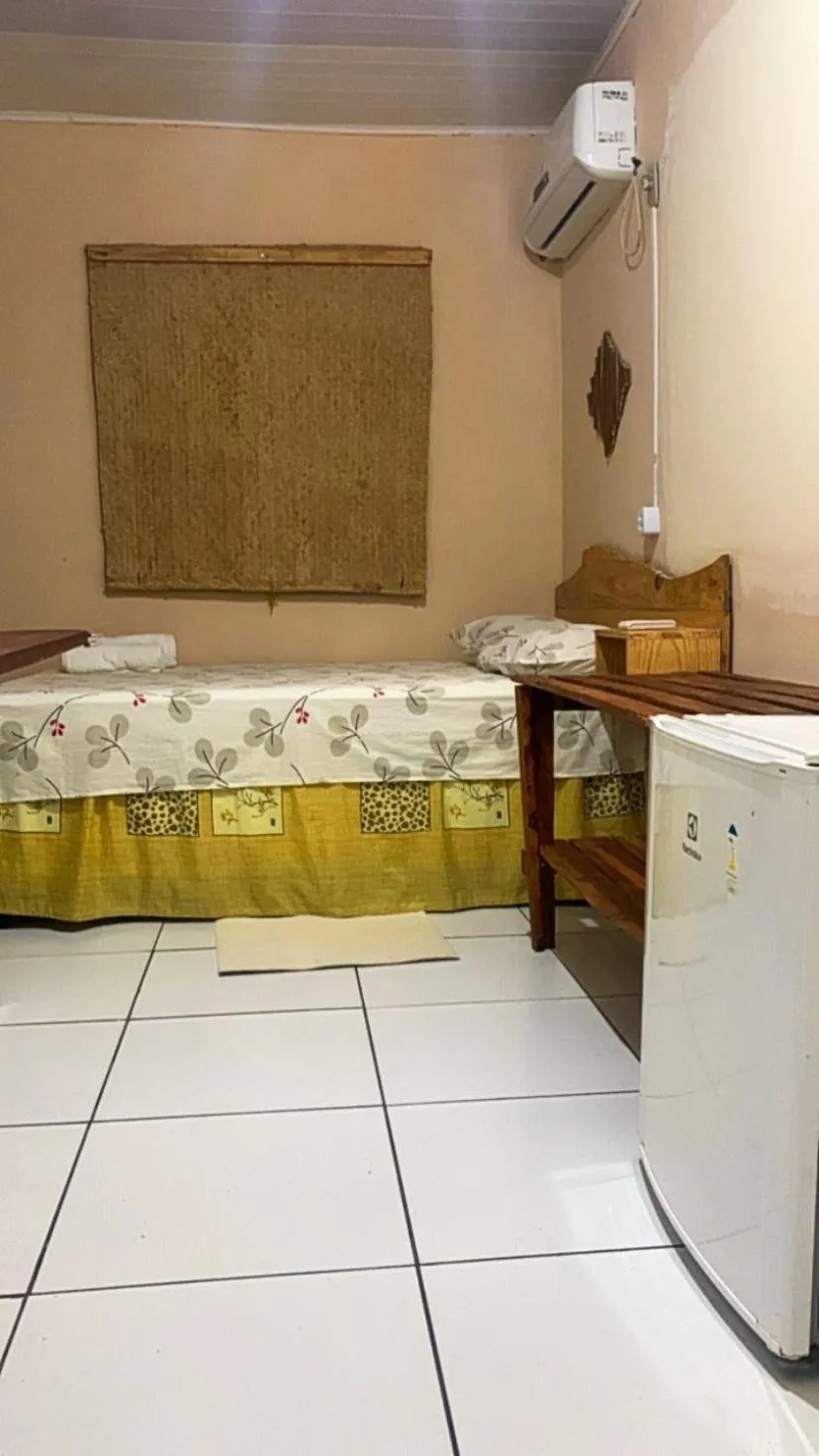 Bed in Pousada Shalom