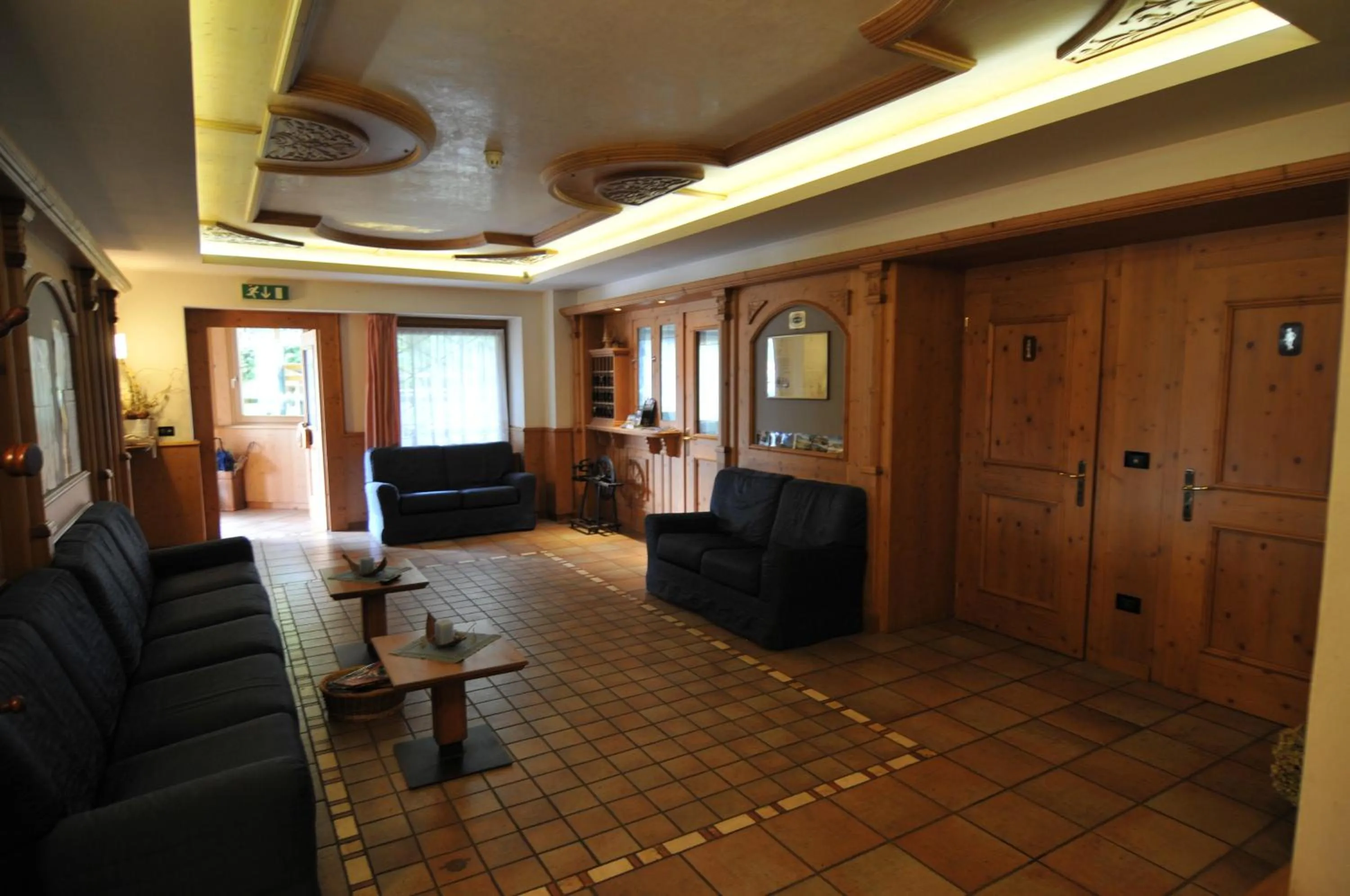 Communal lounge/ TV room in Al Pian Garnì - B&B & Pizza