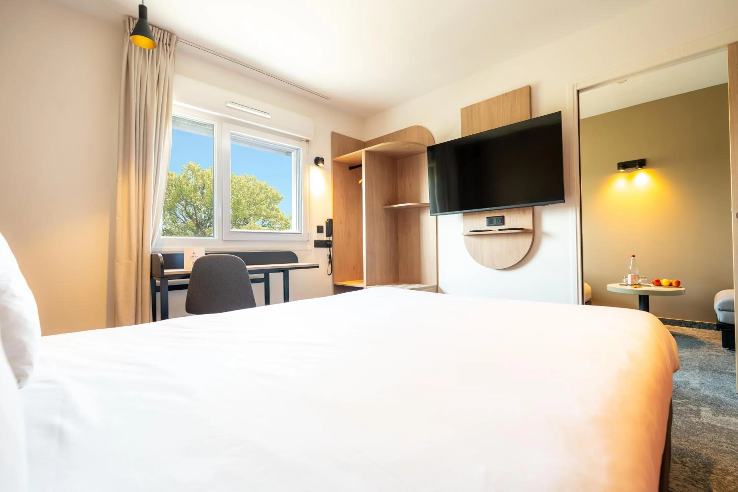 Bed in Hôtel Akena Reims Bezannes