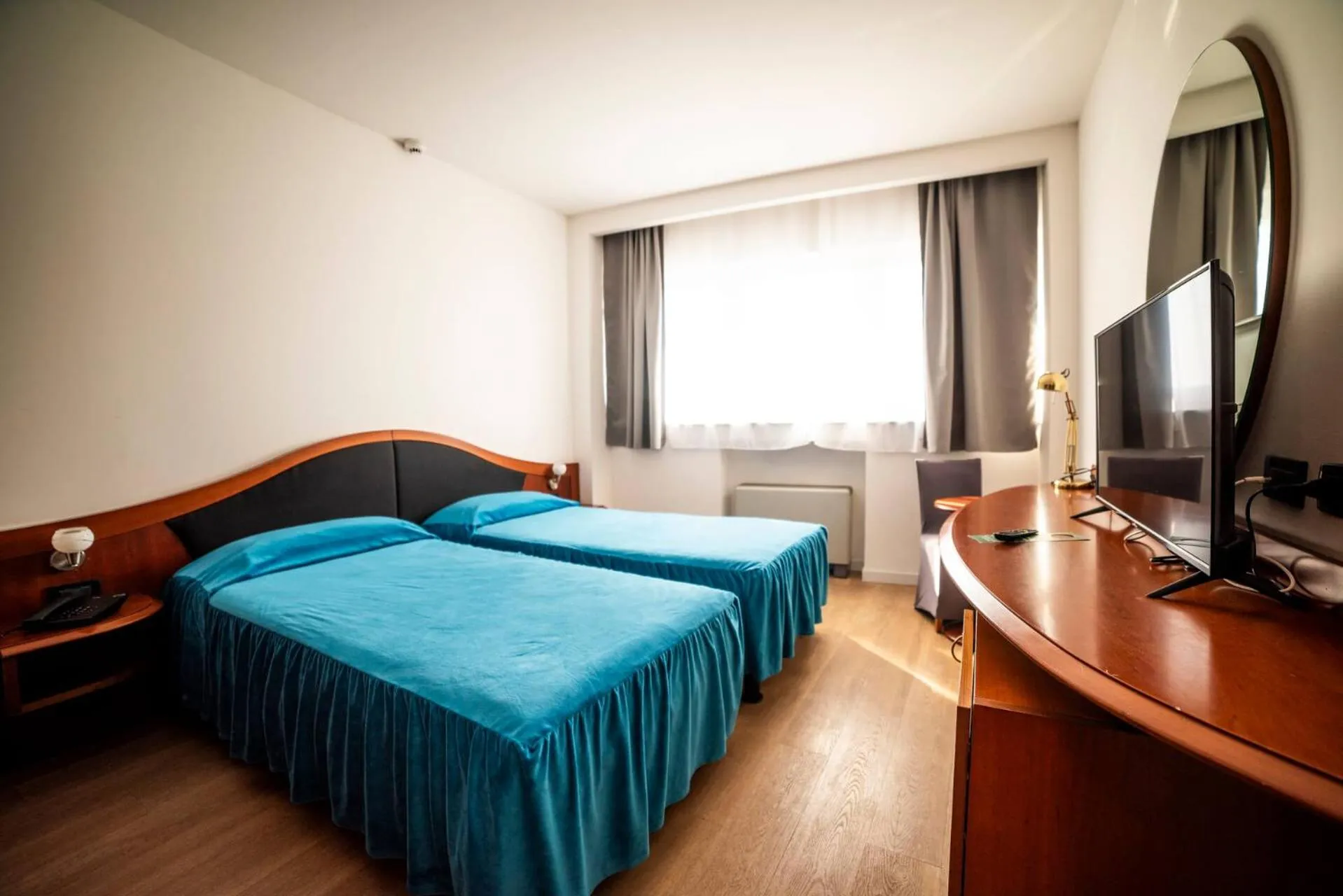 Bed in Hotel Donizetti