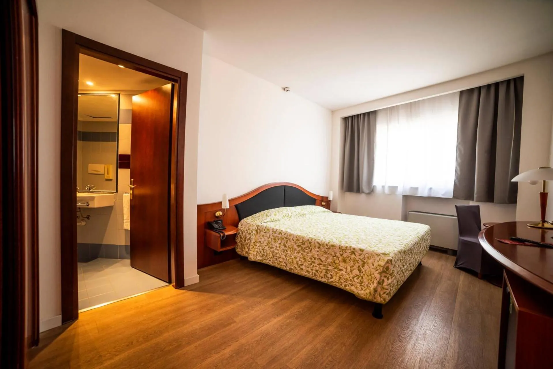 Bed in Hotel Donizetti