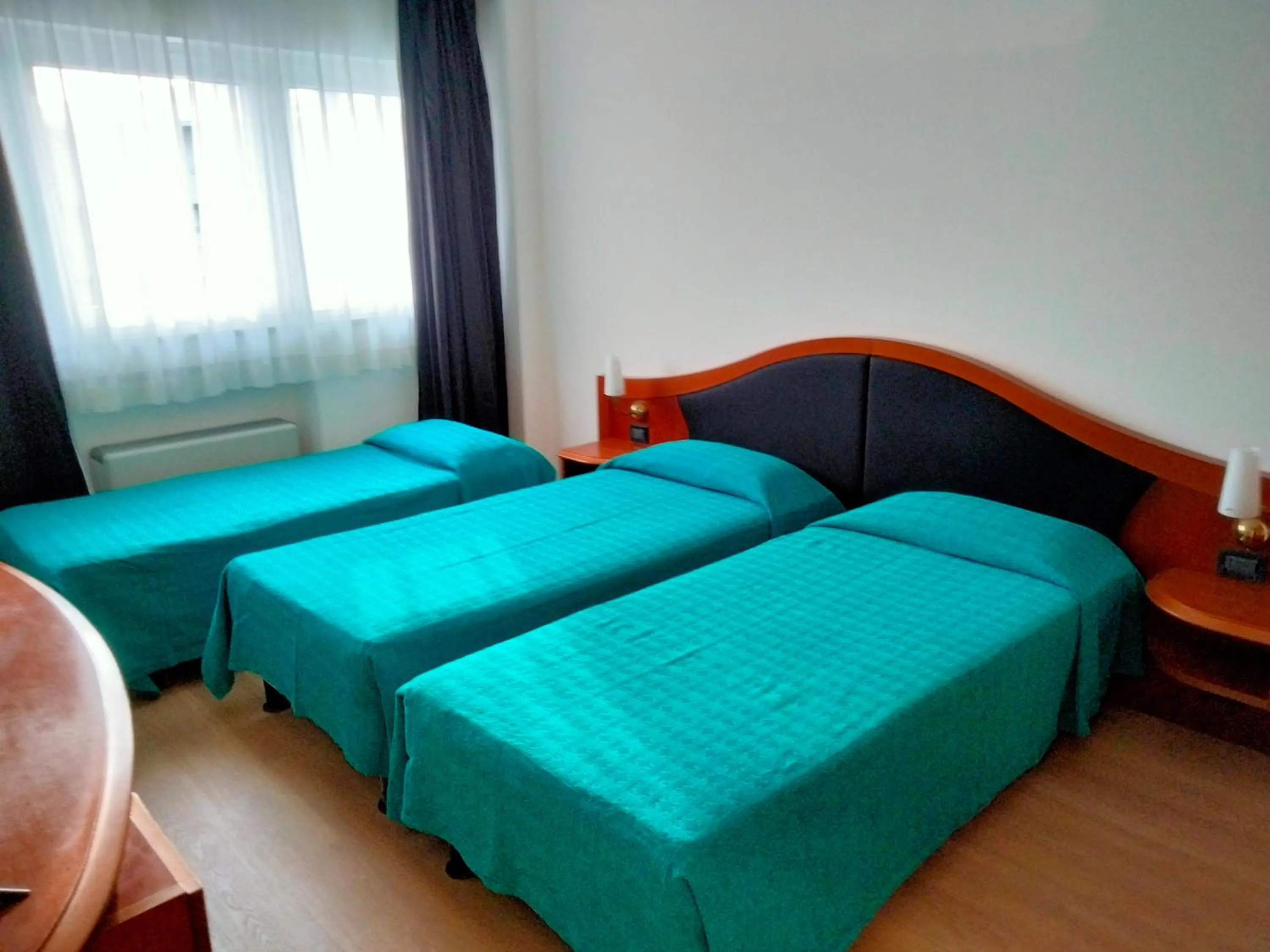 Bed in Hotel Donizetti