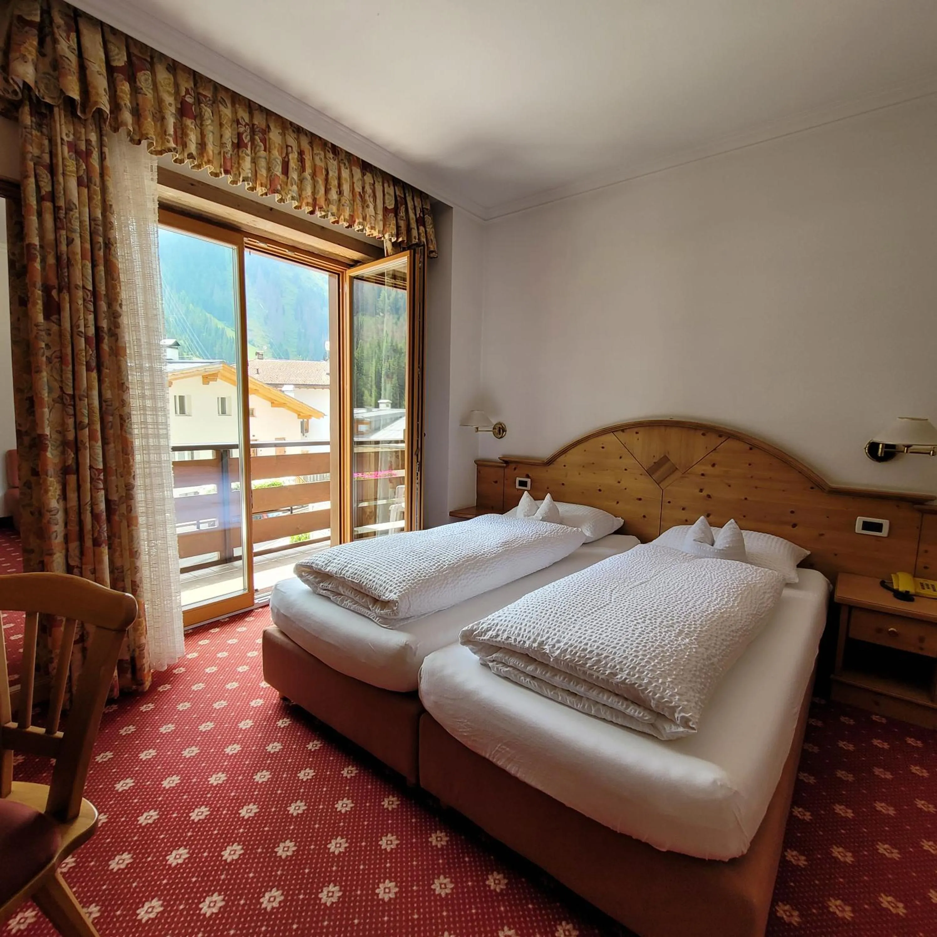 Bed in Hotel Garni Royal