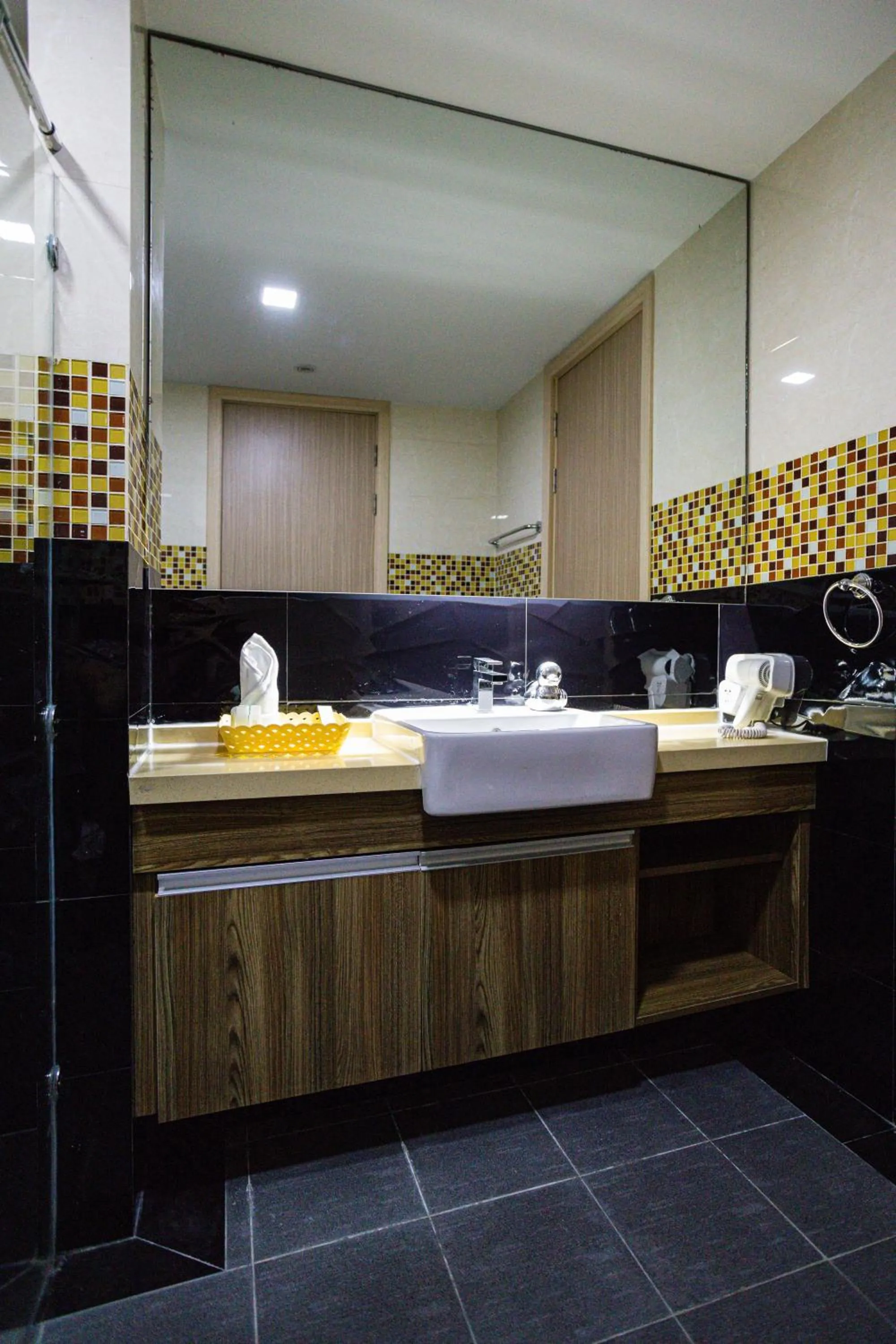 Bathroom in Ramada by Wyndham Bangkok Ten Ekamai Residences