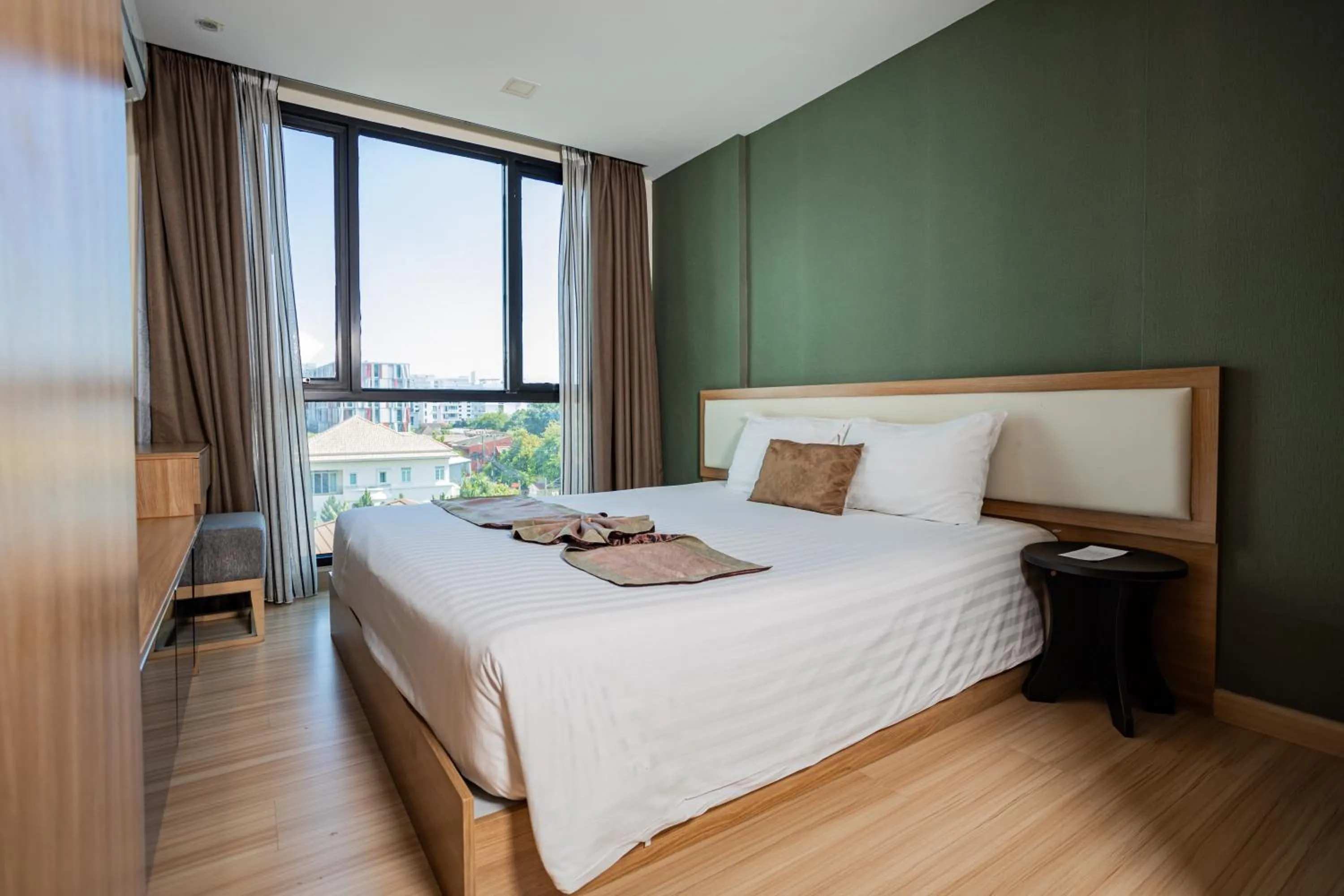 Bed in Ramada by Wyndham Bangkok Ten Ekamai Residences