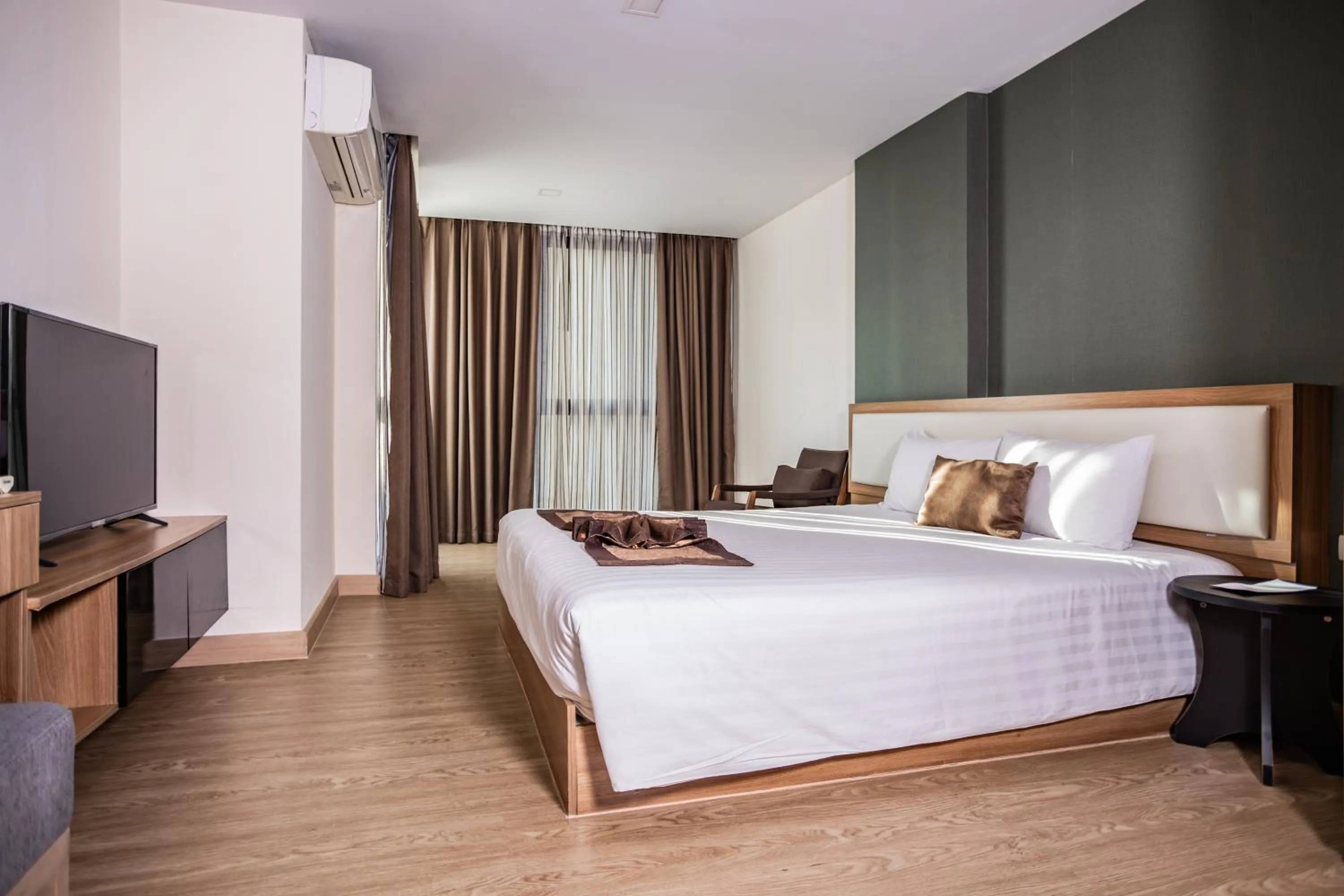 Bed in Ramada by Wyndham Bangkok Ten Ekamai Residences