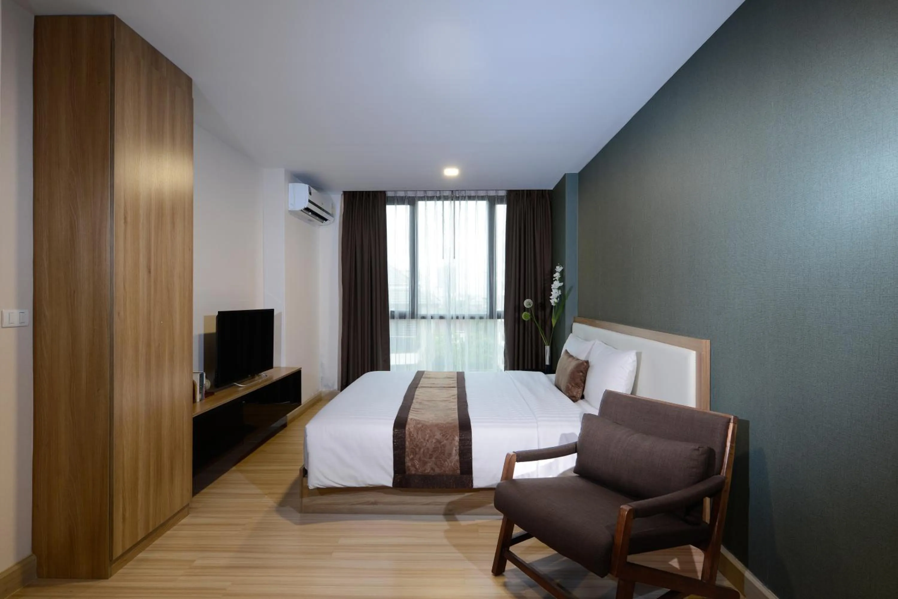 Bed in Ramada by Wyndham Bangkok Ten Ekamai Residences