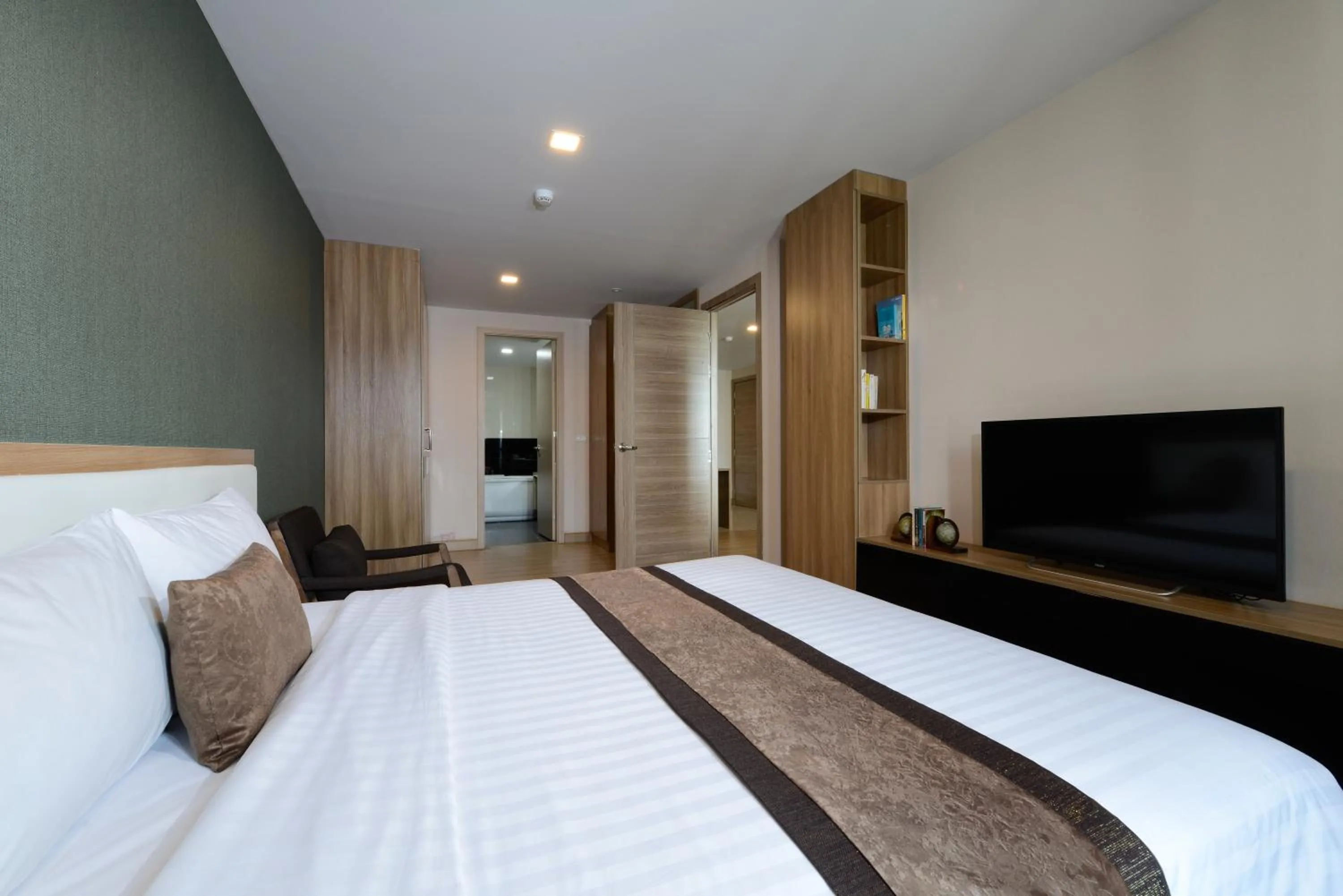 Bed in Ramada by Wyndham Bangkok Ten Ekamai Residences