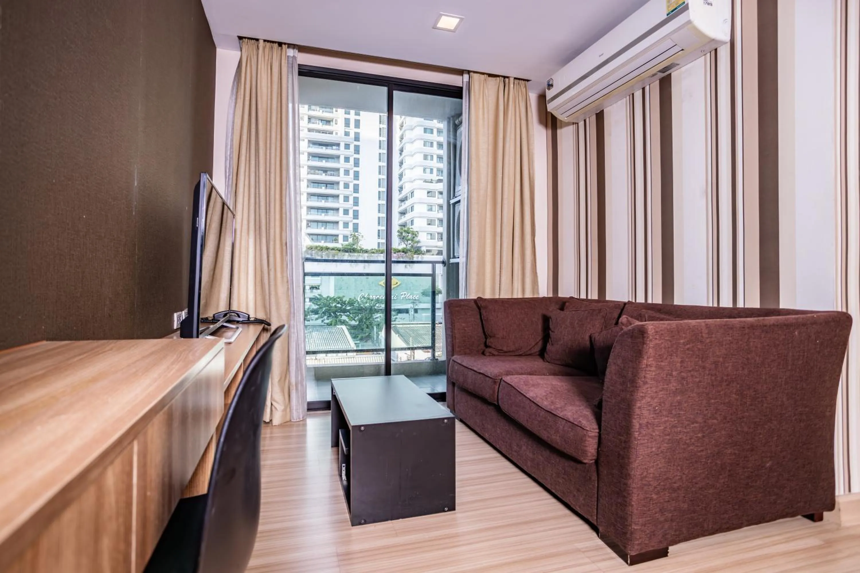 TV and multimedia in Ramada by Wyndham Bangkok Ten Ekamai Residences