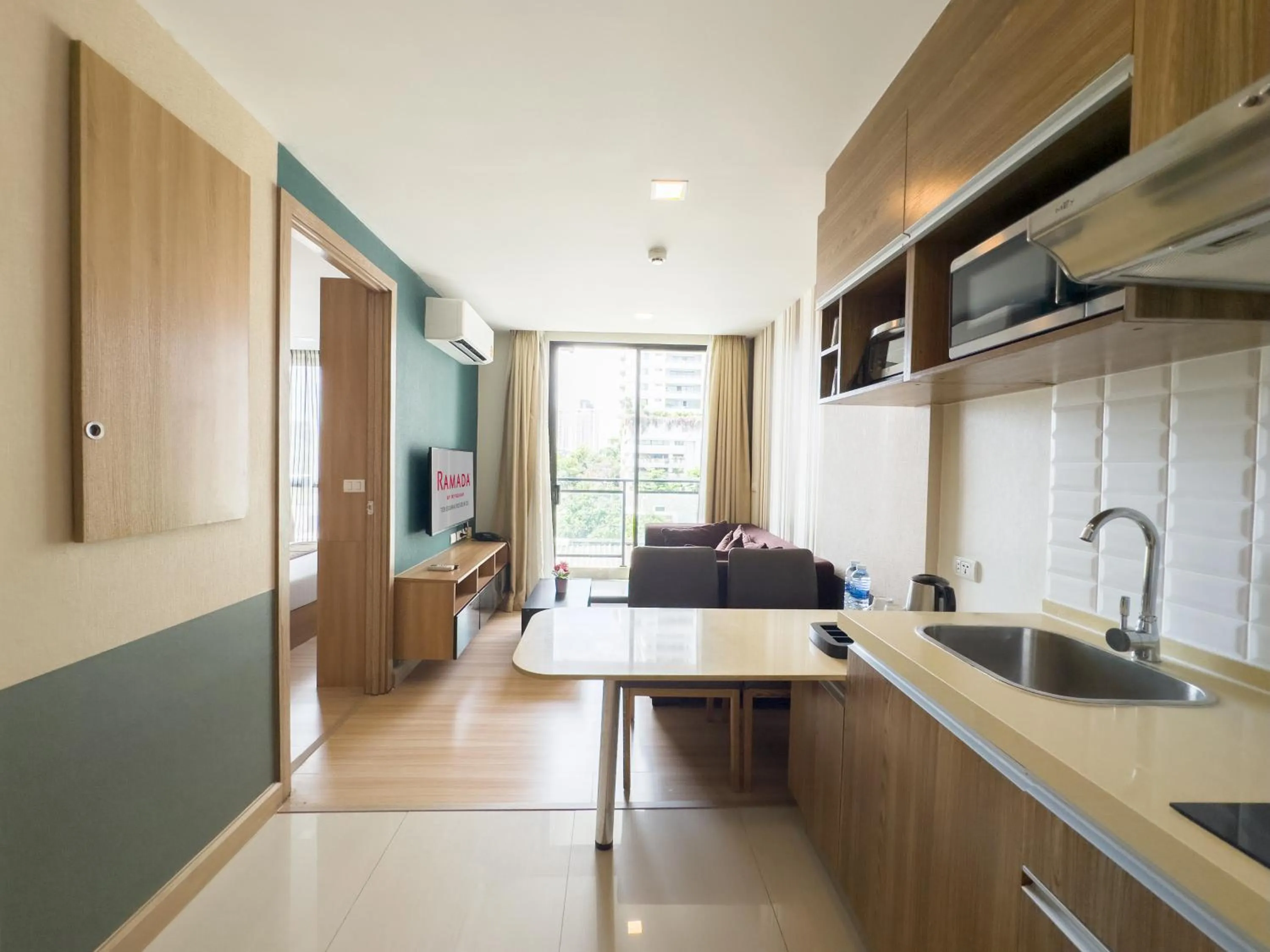 Living room in Ramada by Wyndham Bangkok Ten Ekamai Residences