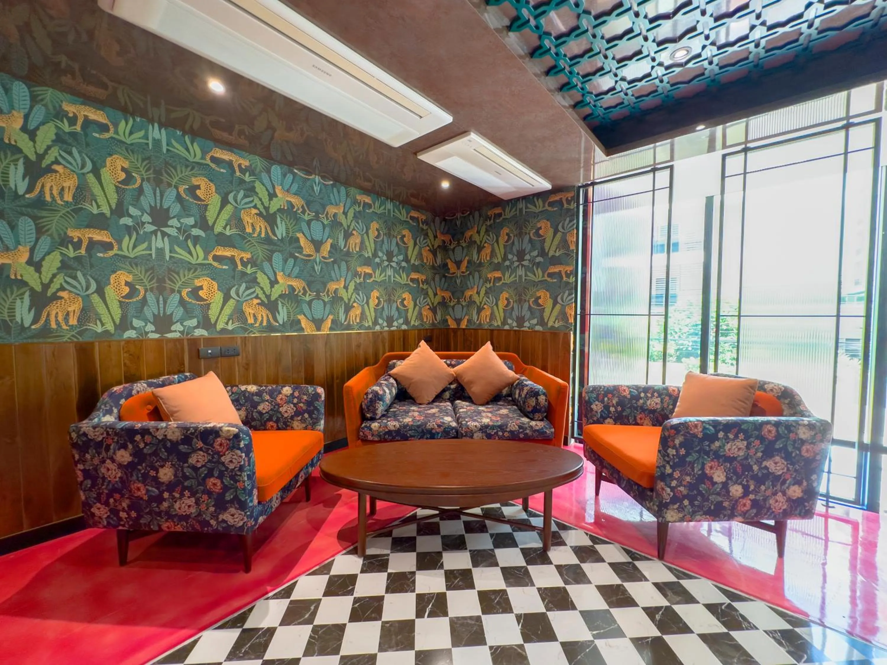 Seating area in Ramada by Wyndham Bangkok Ten Ekamai Residences