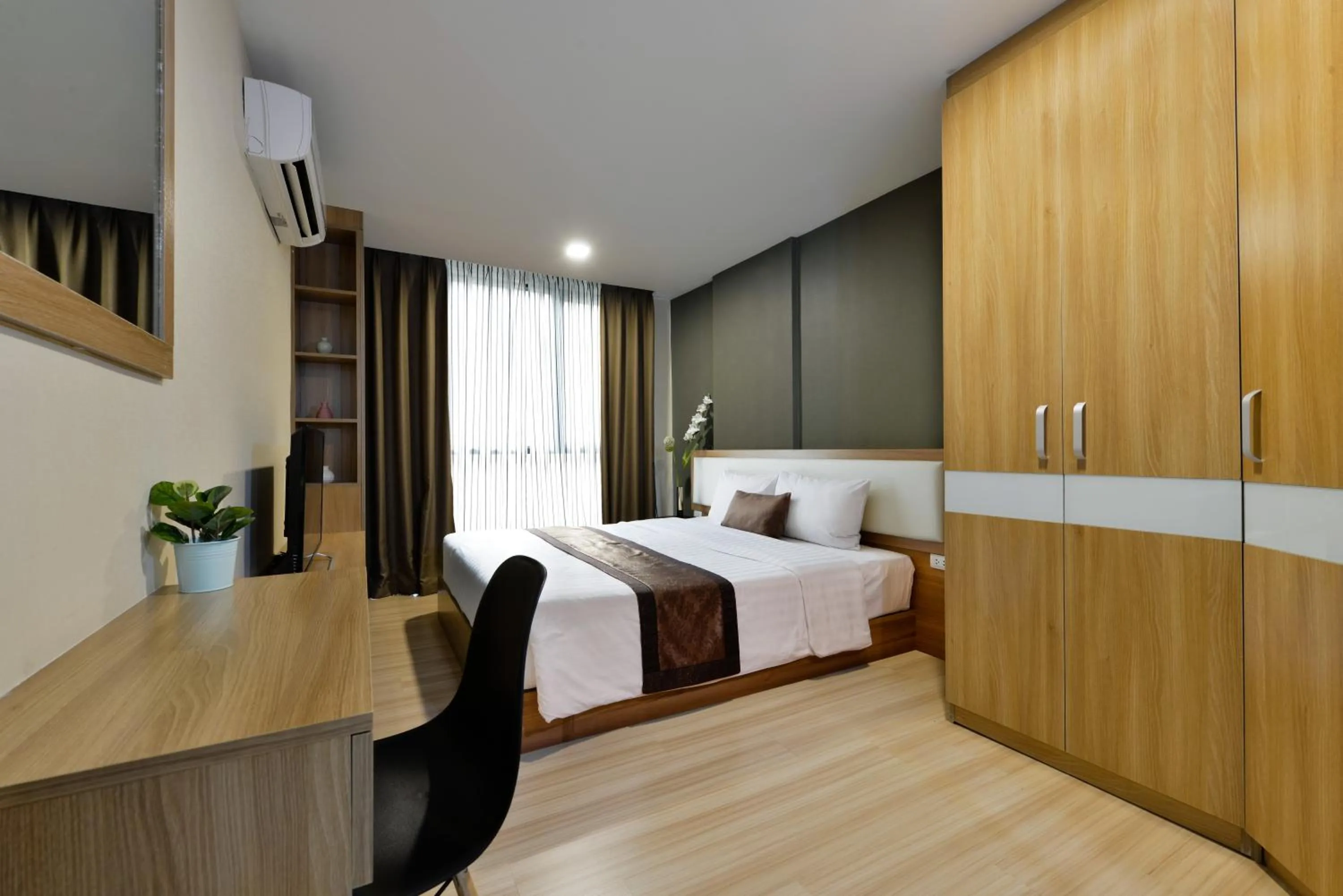 Bedroom, Bed in Ramada by Wyndham Bangkok Ten Ekamai Residences