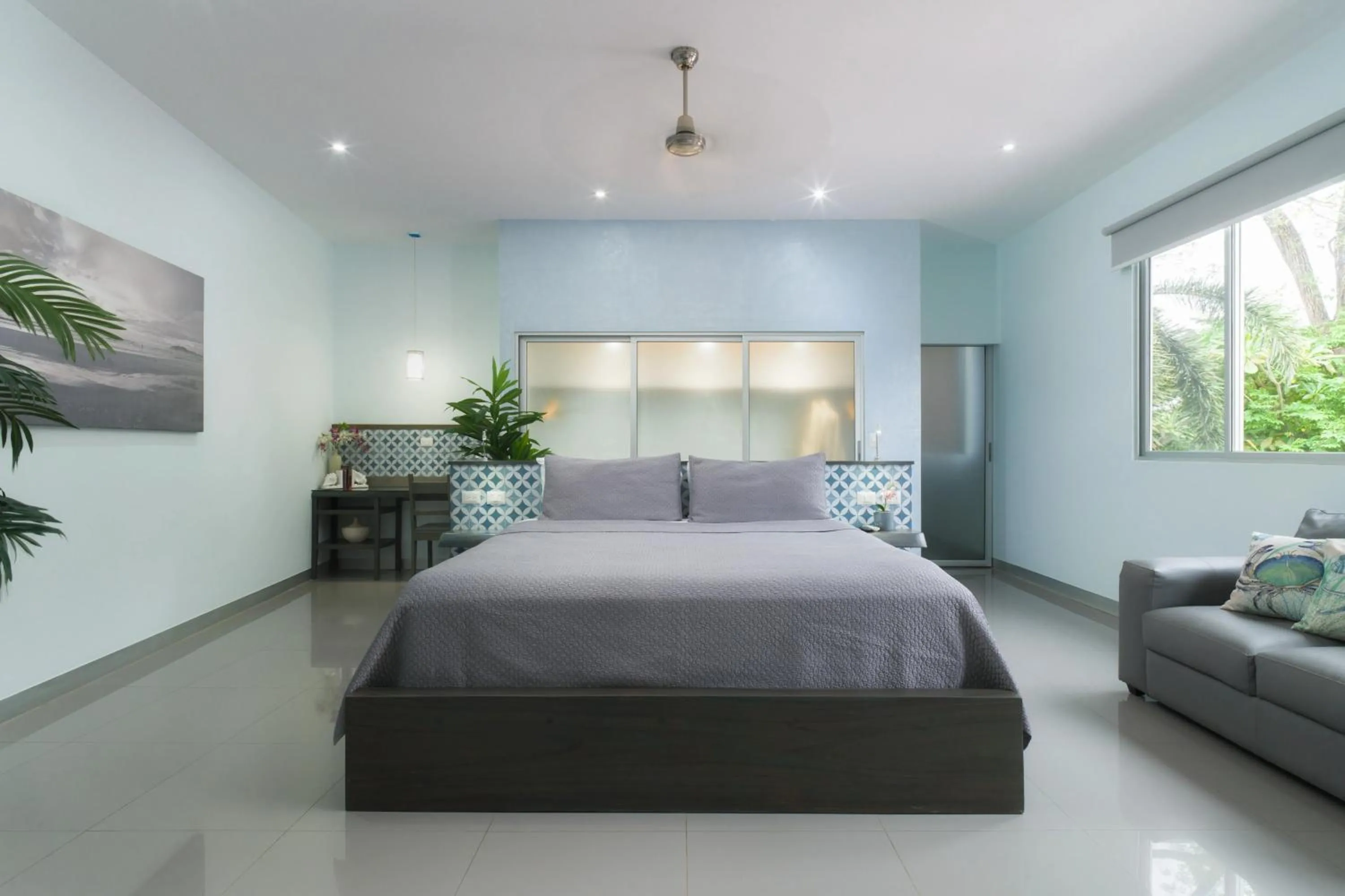 Bed in Tamarindo Bay Boutique Hotel, Apartments & Suites