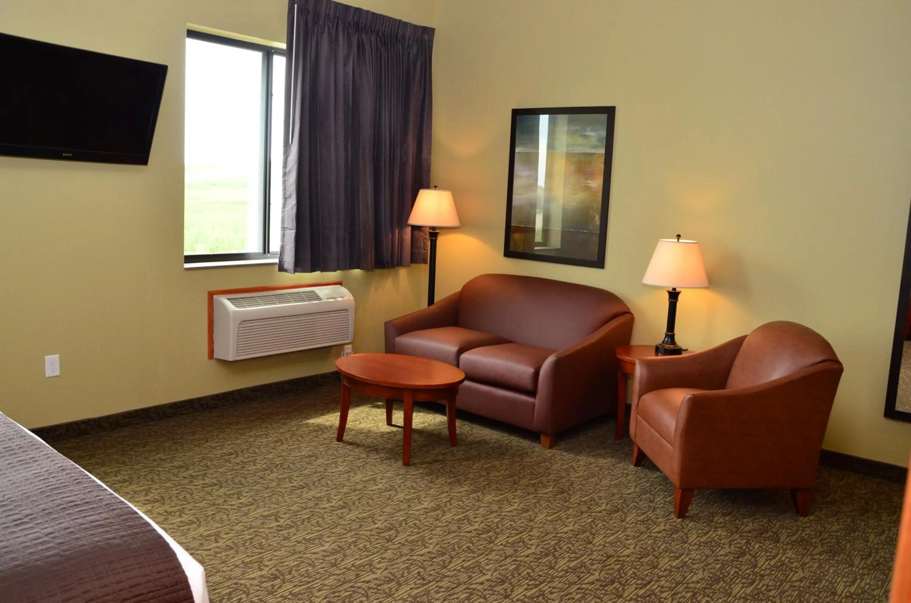 Bed in Cobblestone Inn & Suites - Newton