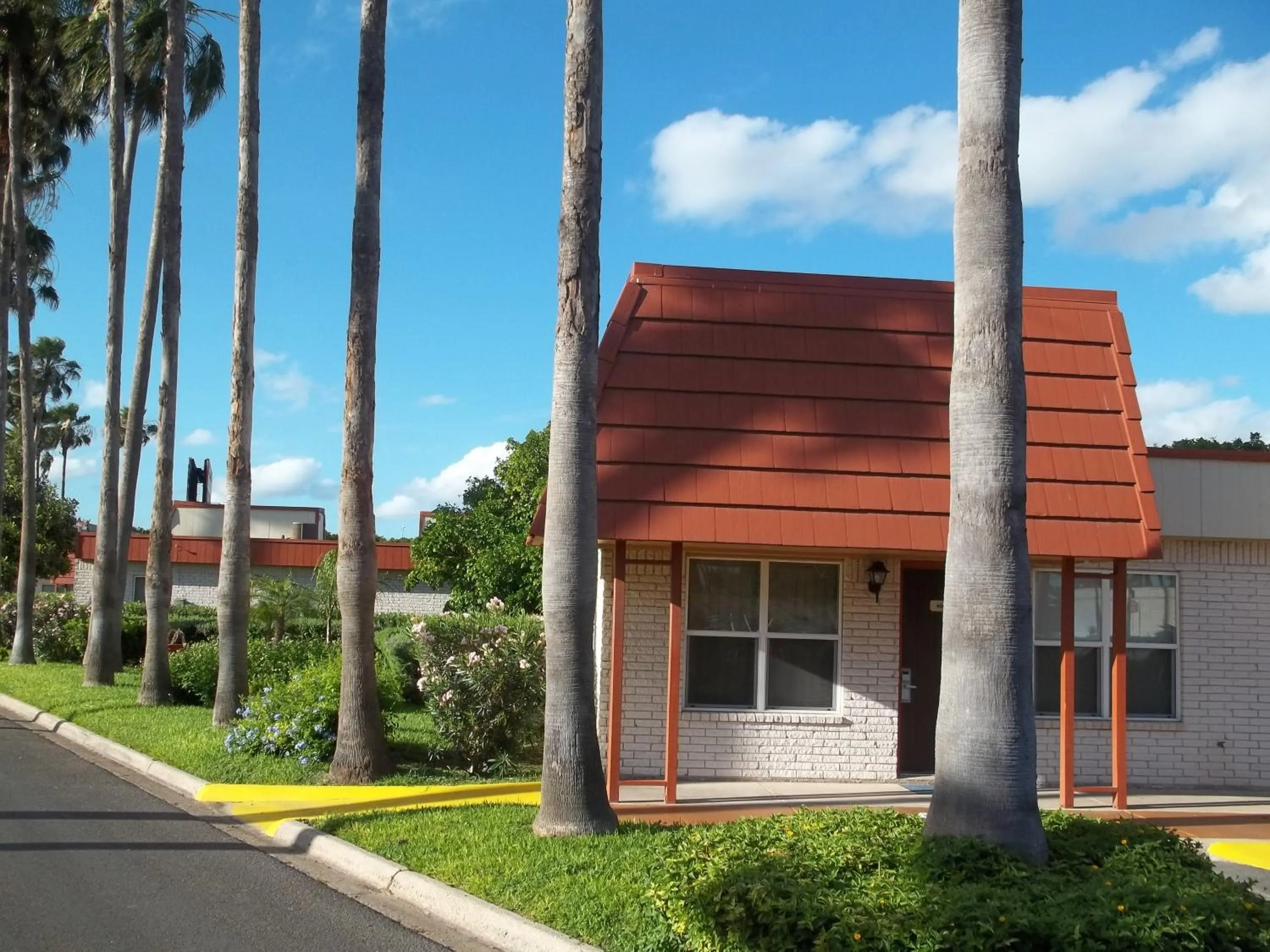 Property building in Victoria Palms Inn and Suites