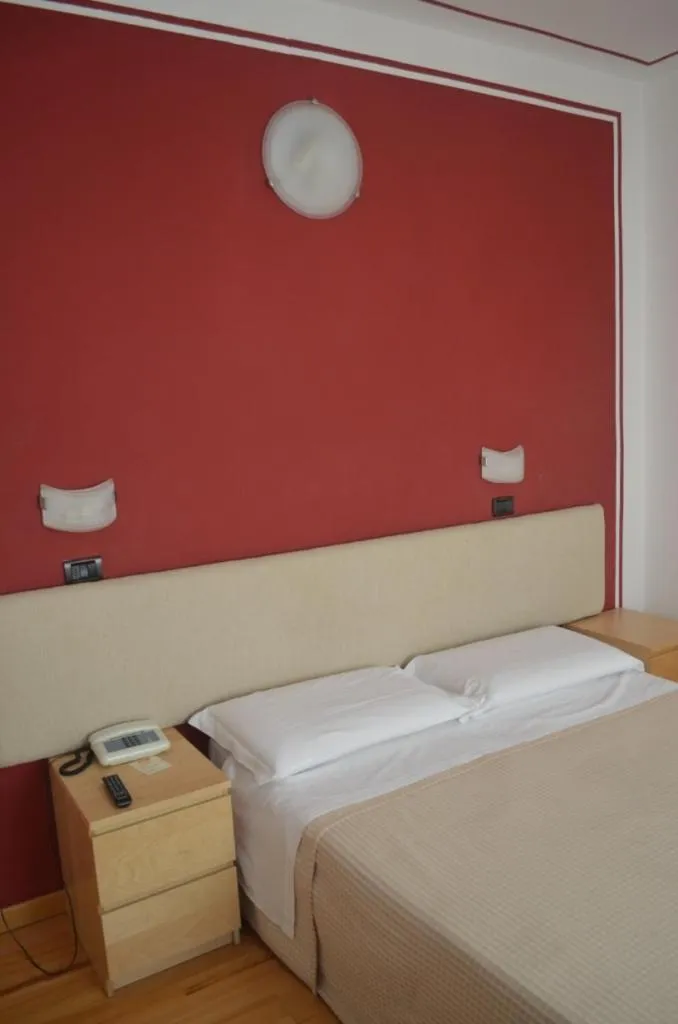 Bed in Hotel Paradiso
