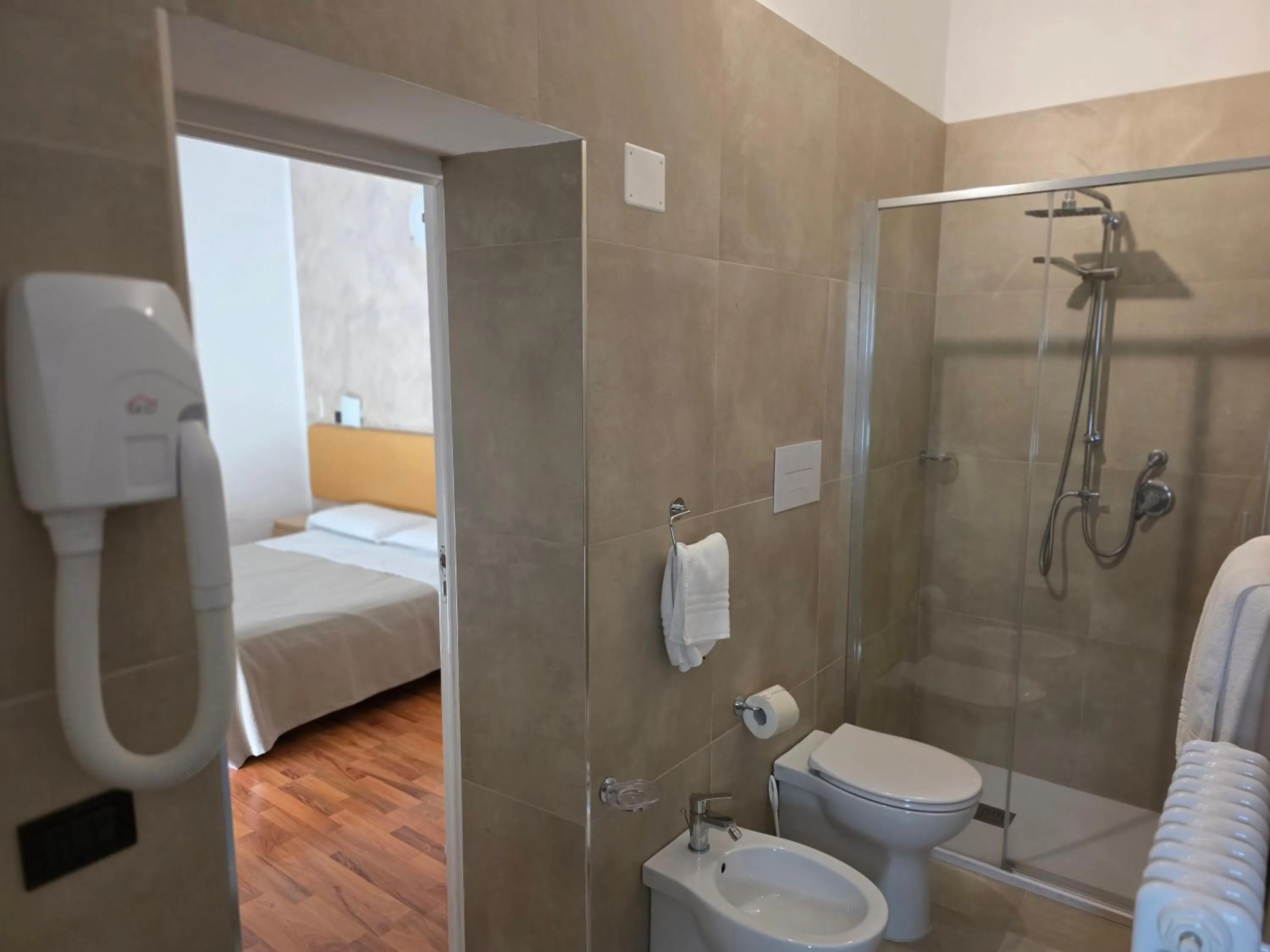 Bed in Hotel Paradiso