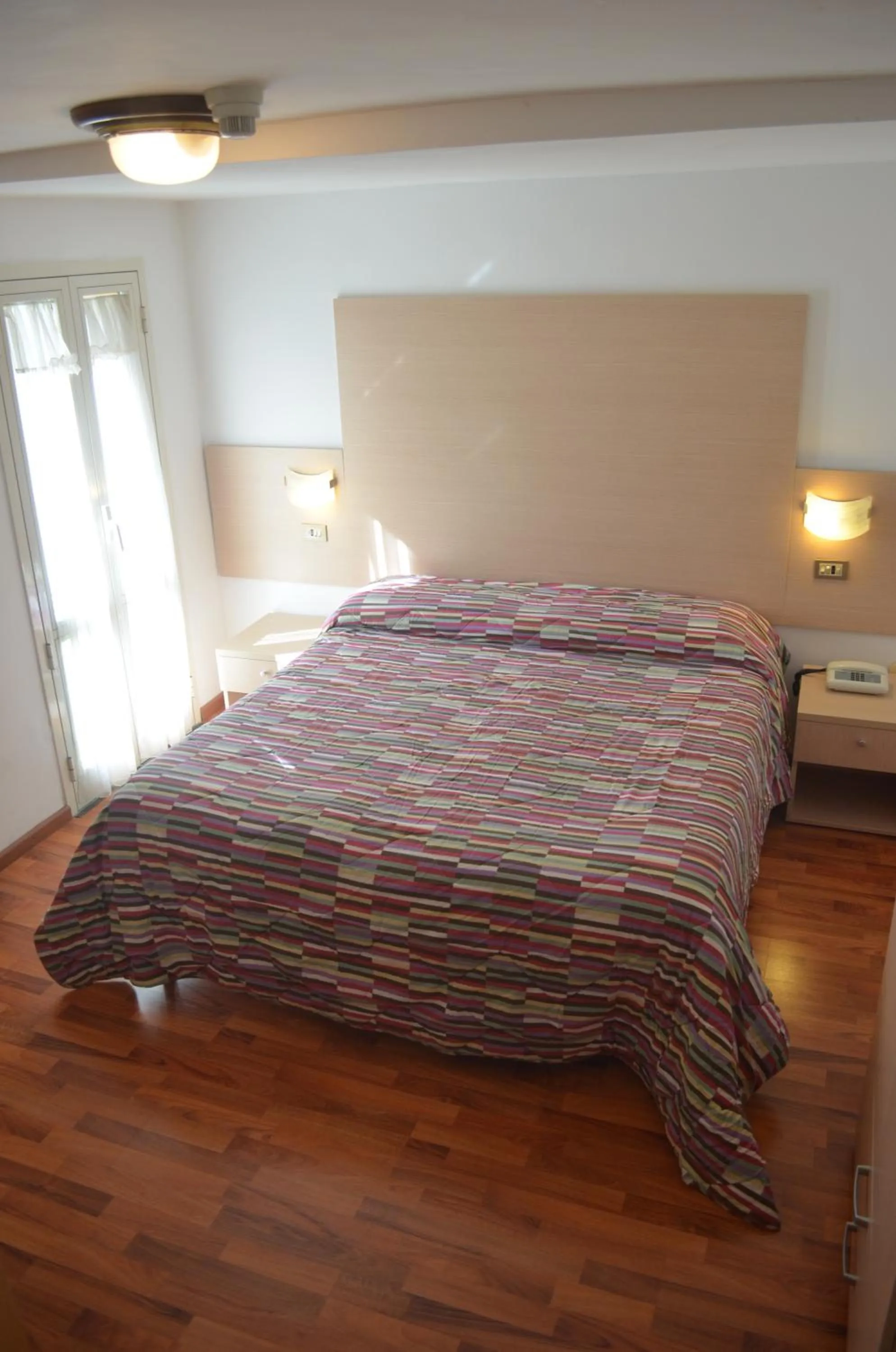 Bed in Hotel Paradiso