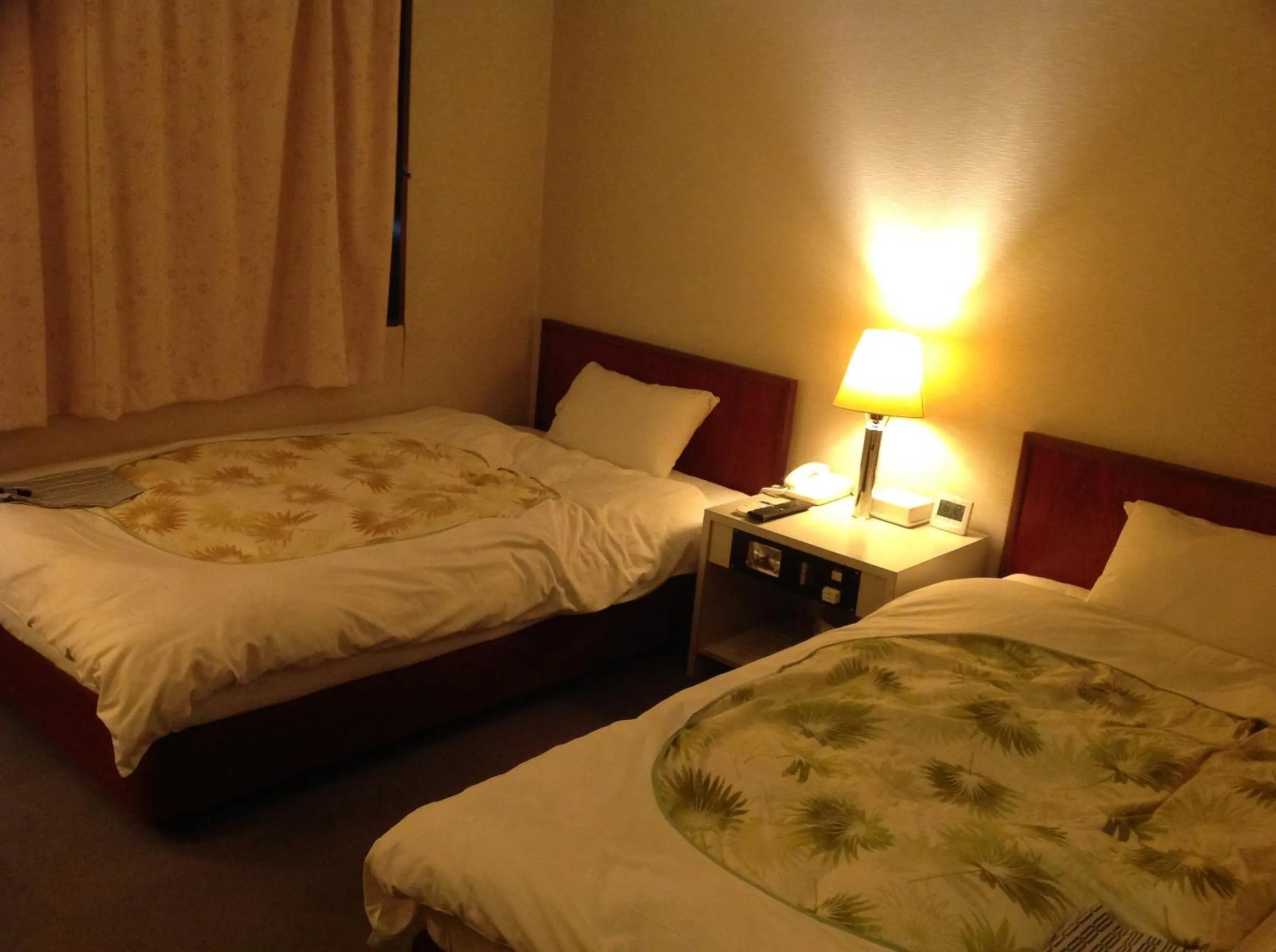 Photo of the whole room, Bed in Jyonai Hotel