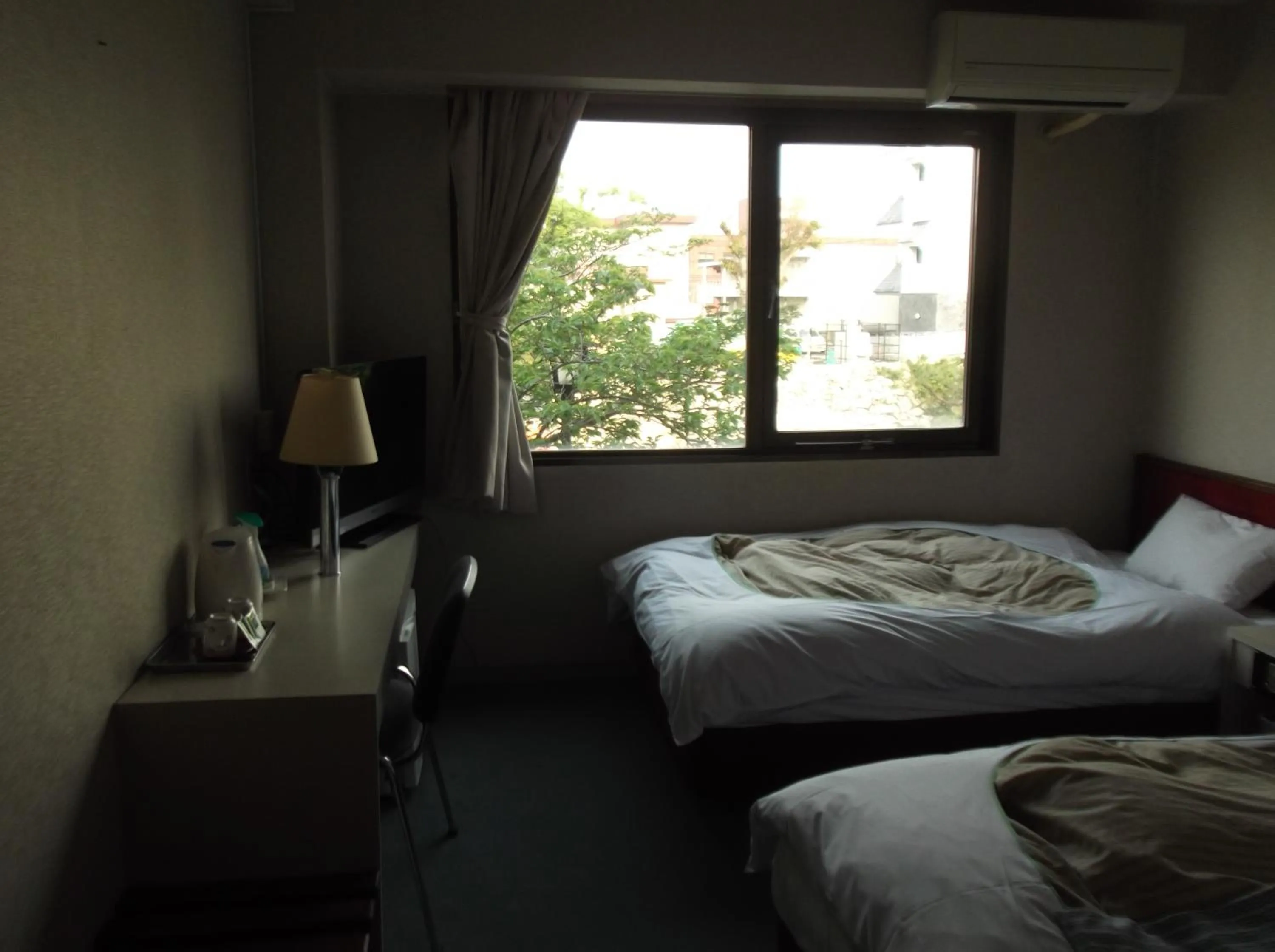 Bed in Jyonai Hotel