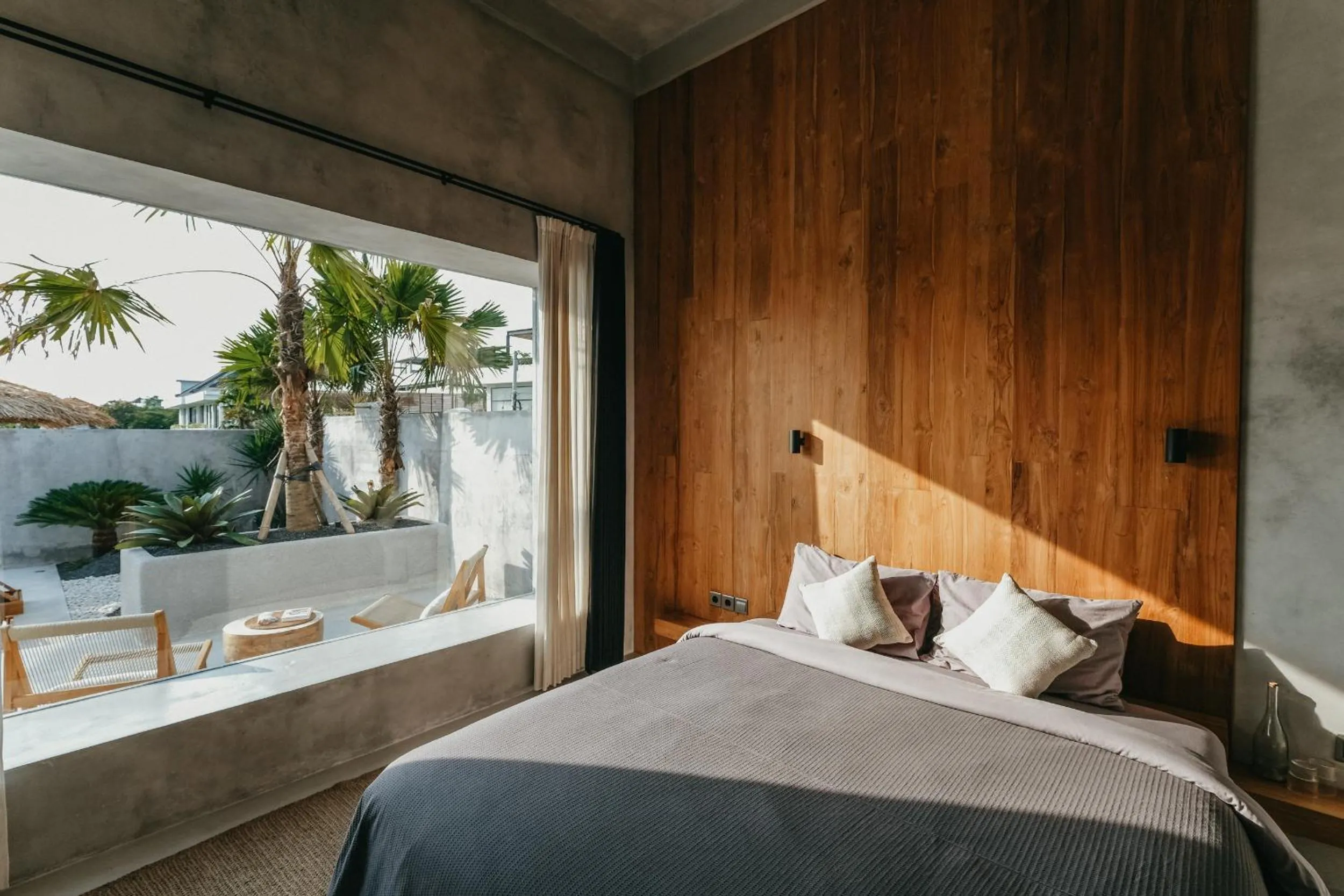 Bed in Concrete Retreat Villa