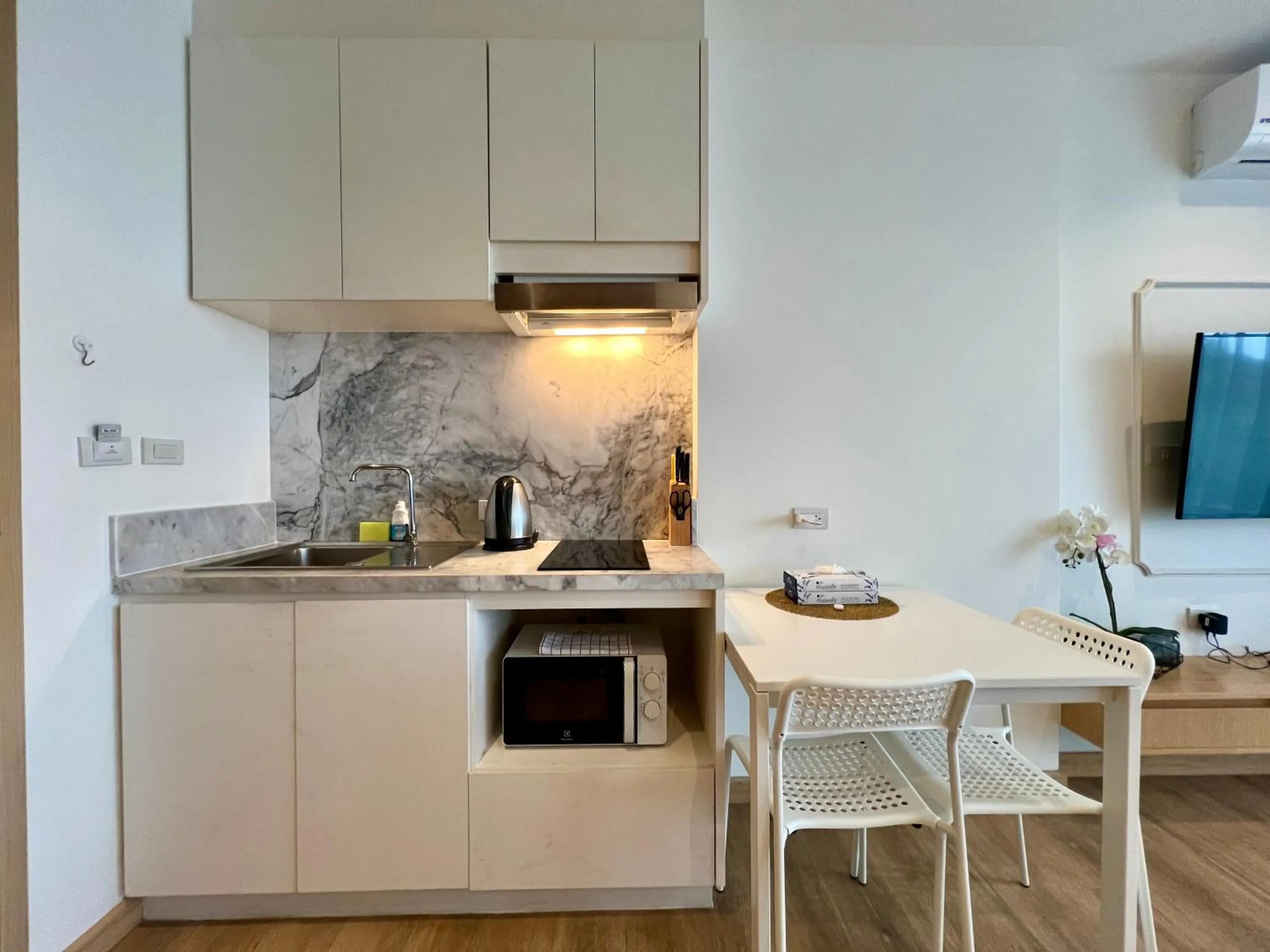 kitchen in Aristo 2 Phuket by RESAVA