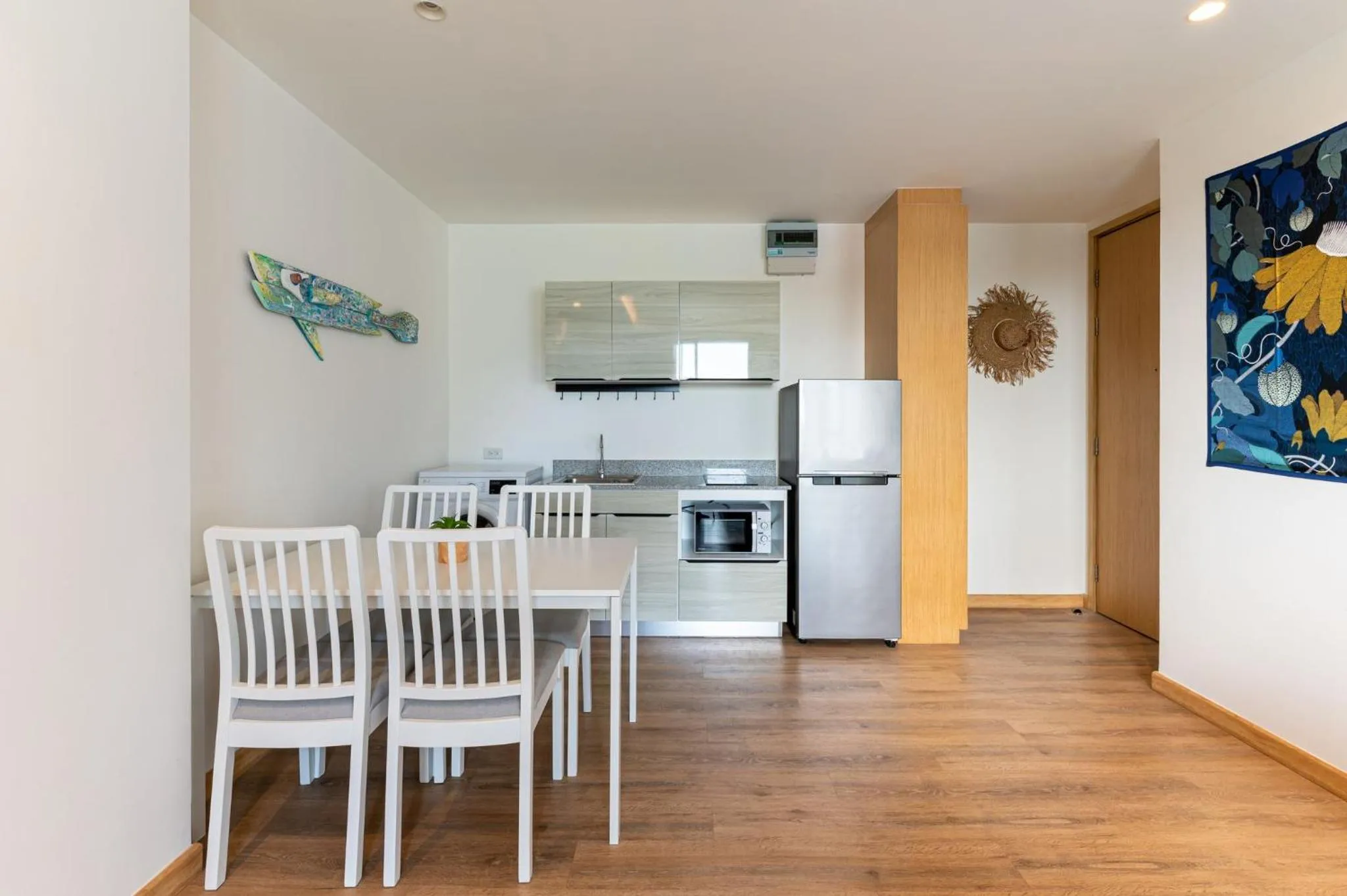 Dining area in Aristo 2 Phuket by RESAVA