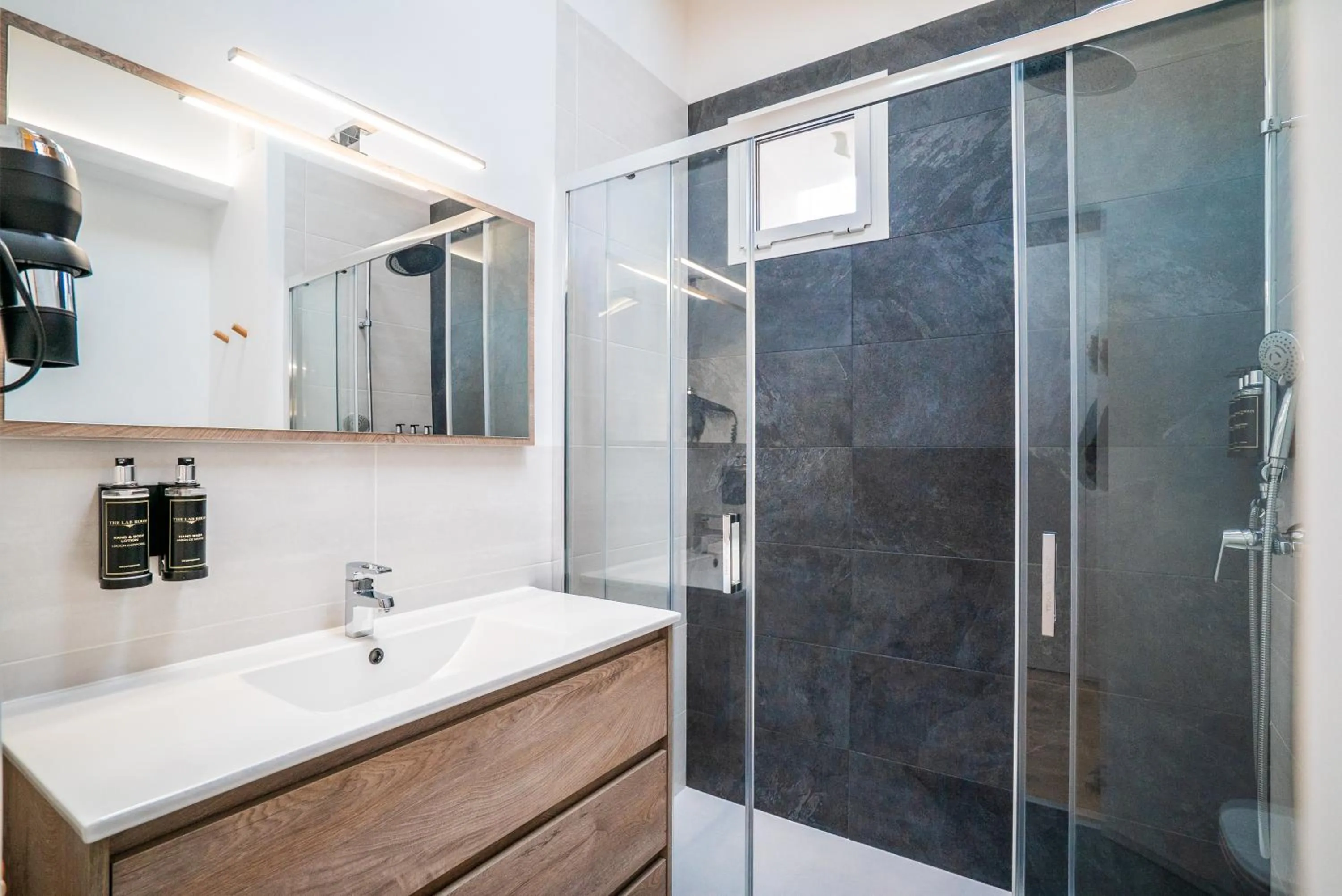 Shower in Smartr Madrid Gran Via Apartments