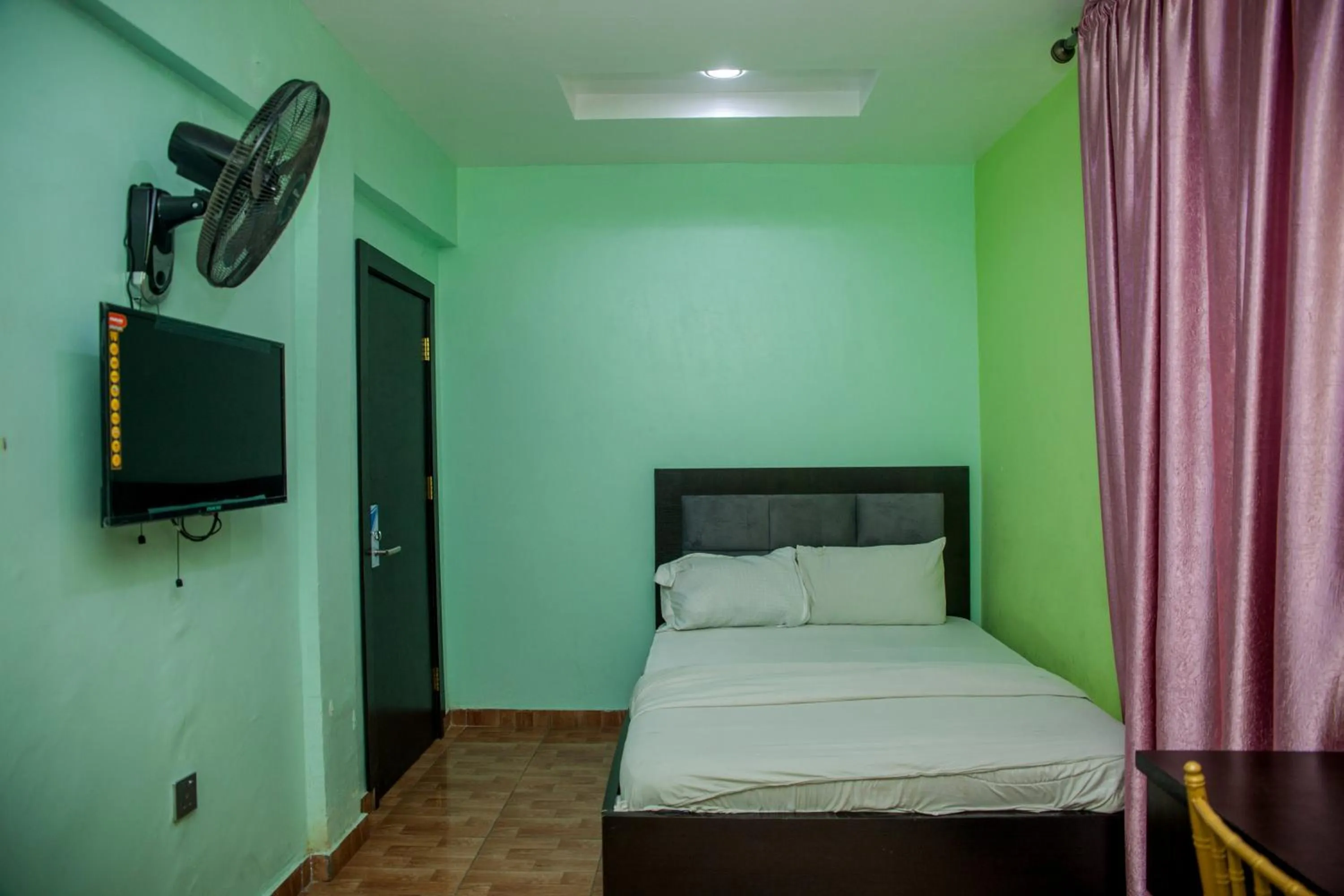 Bedroom in Emmy Hotels & Suites