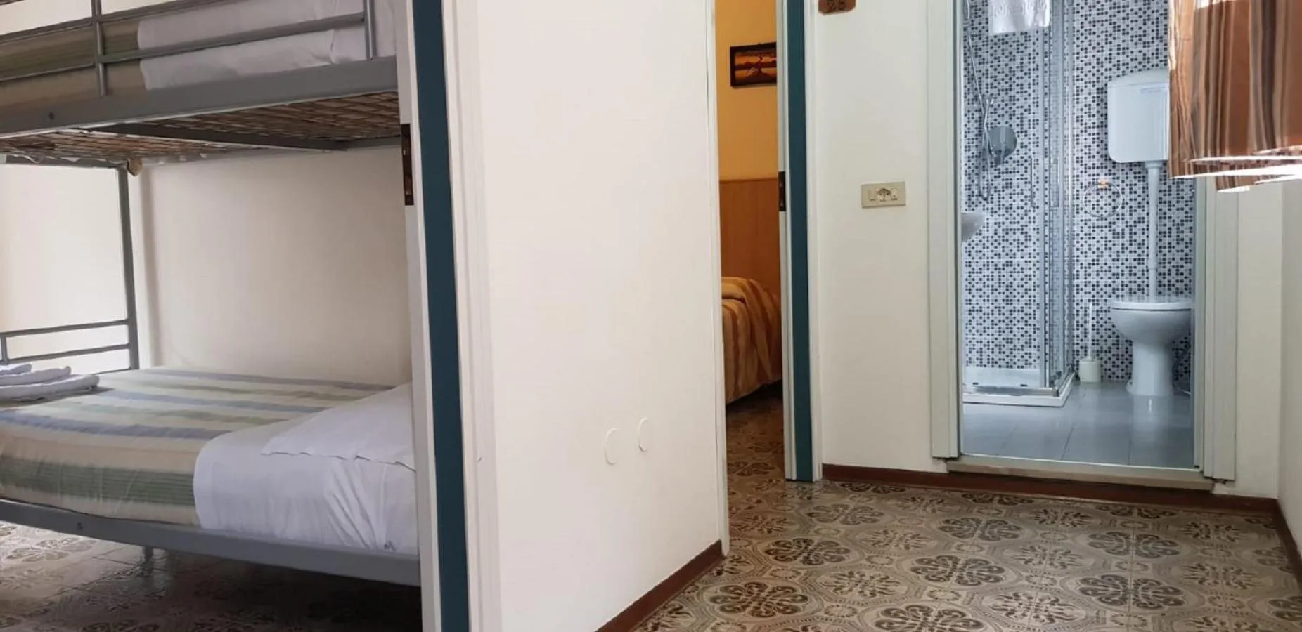 Bathroom, Bed in Hotel Enrica