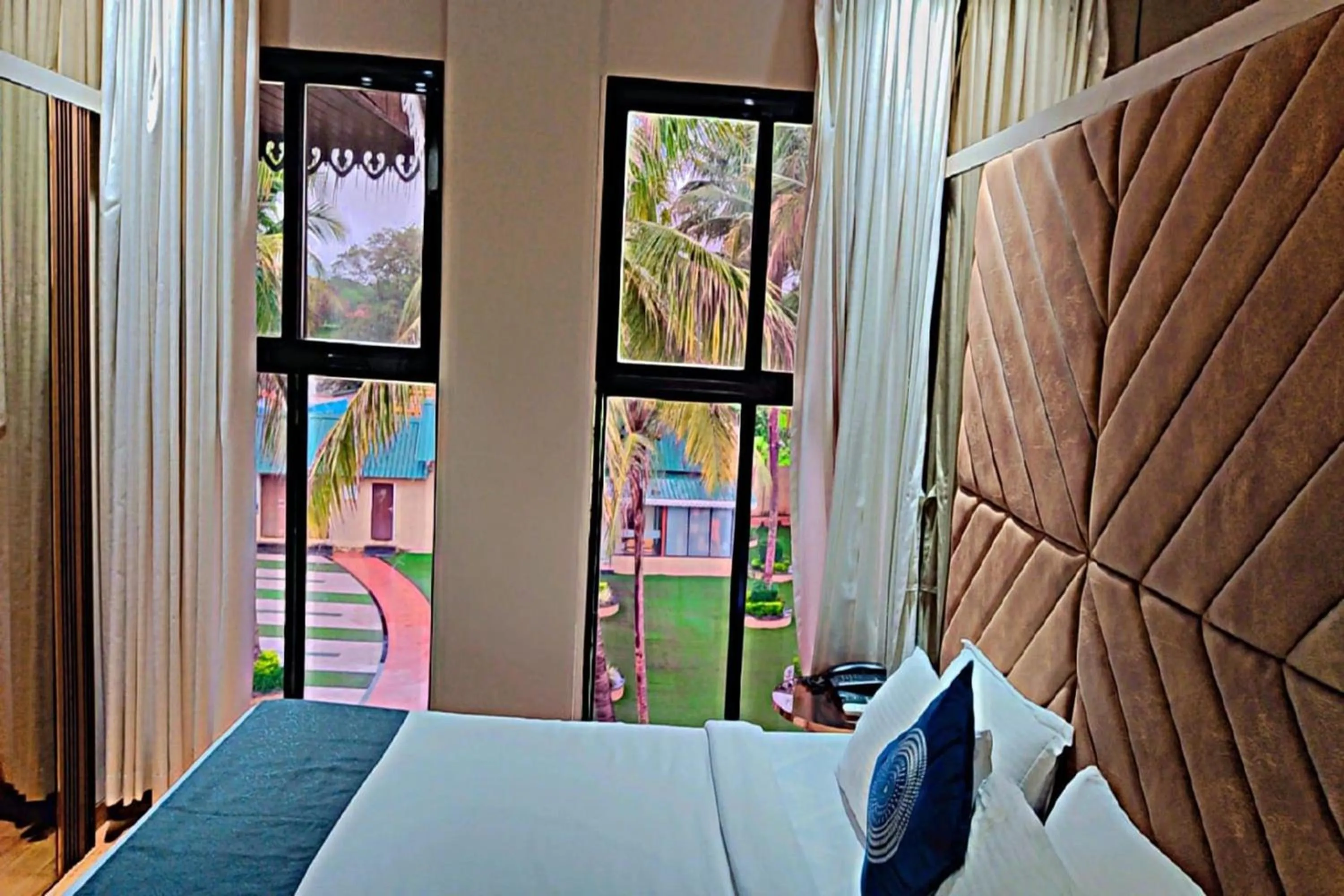 Bed in Paramount Riverfront Resort & Spa, Karjat