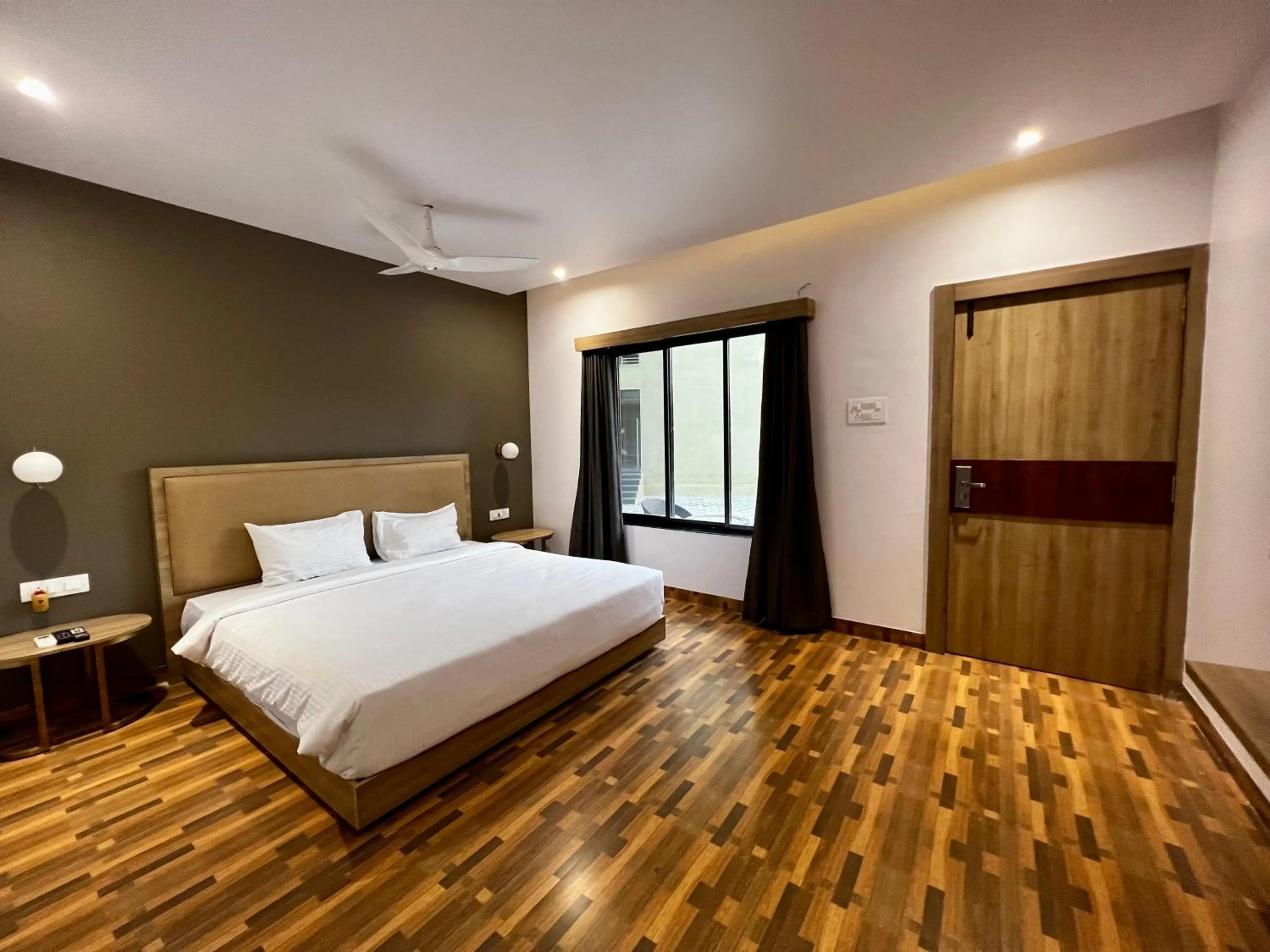 Bed in Paramount Riverfront Resort & Spa, Karjat