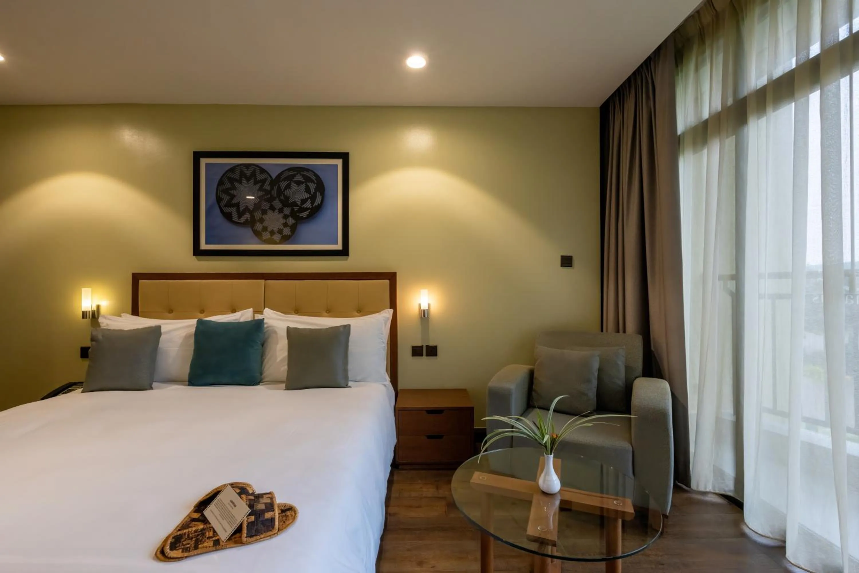 Bed in Mantis Kivu Marina Bay Hotel