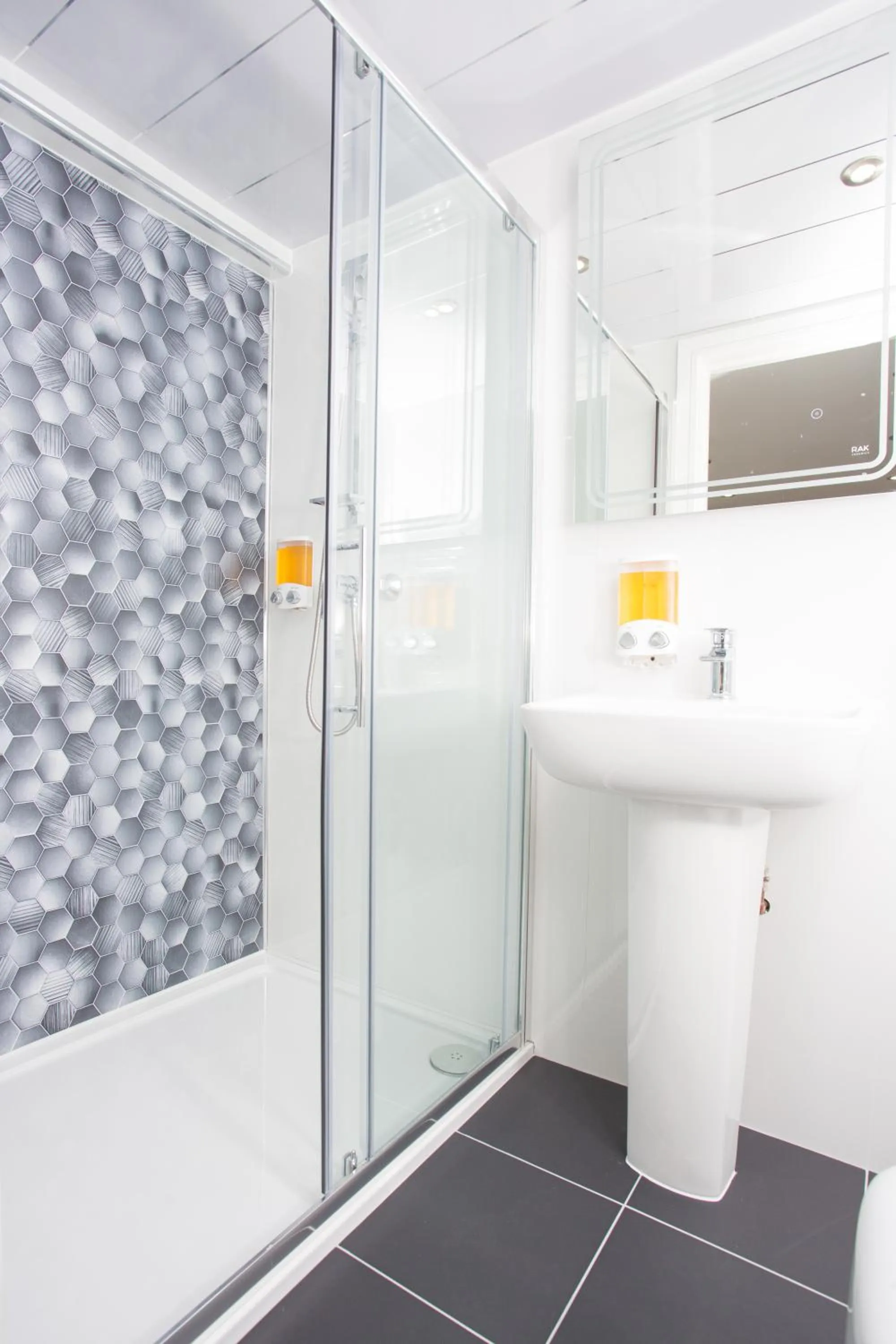 Shower in Legoland Heathrow Windsor Apartment Hotel