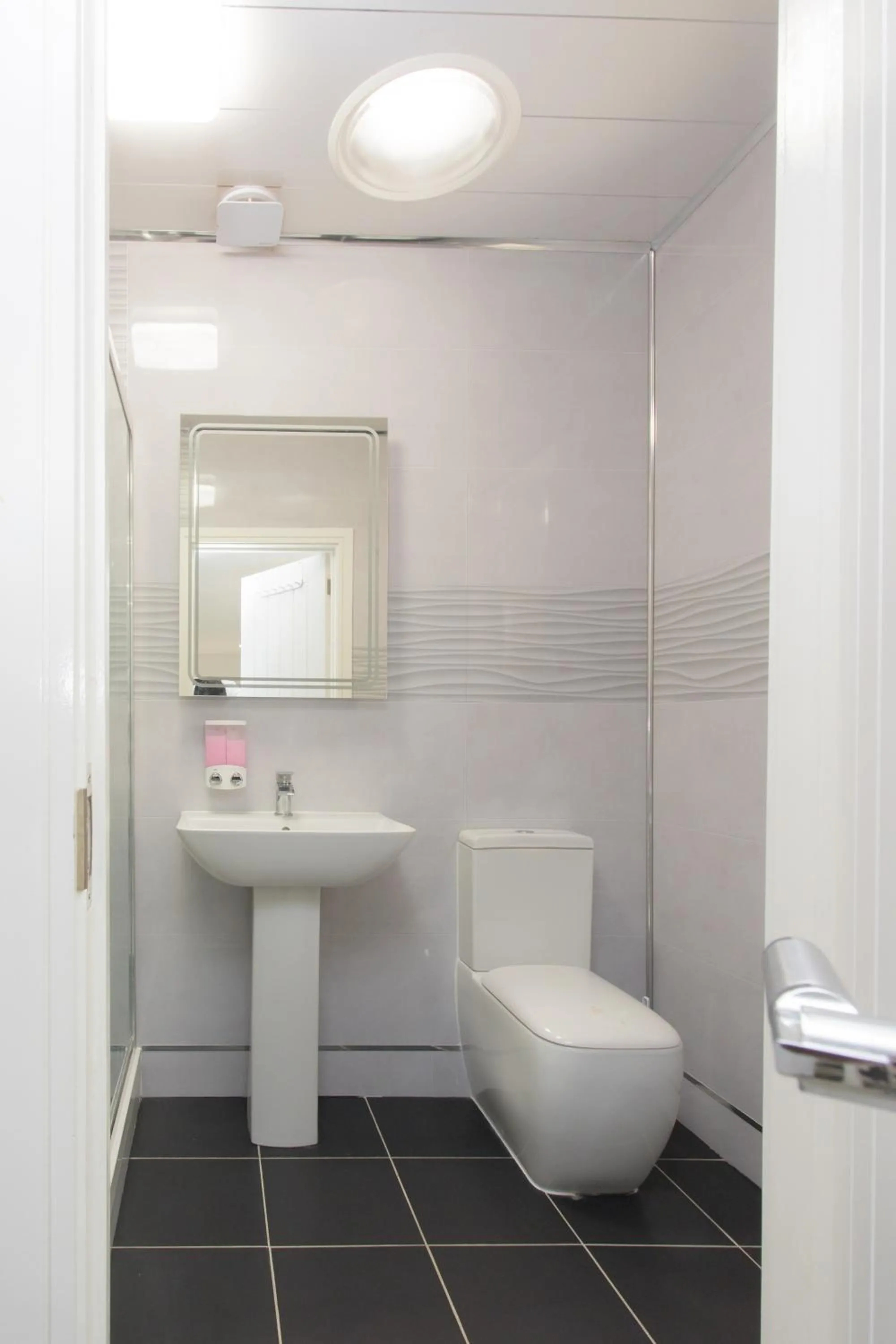 Toilet in Legoland Heathrow Windsor Apartment Hotel