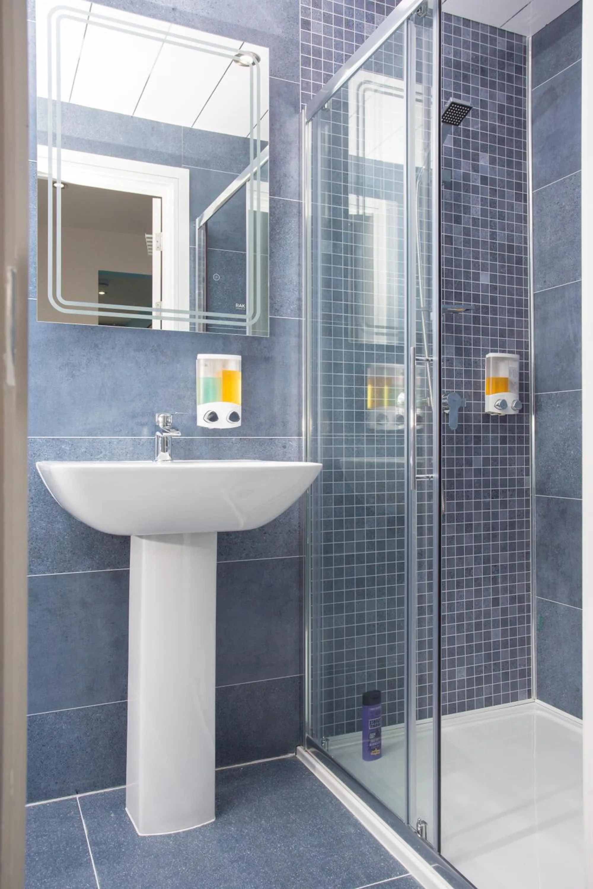 Shower in Legoland Heathrow Windsor Apartment Hotel