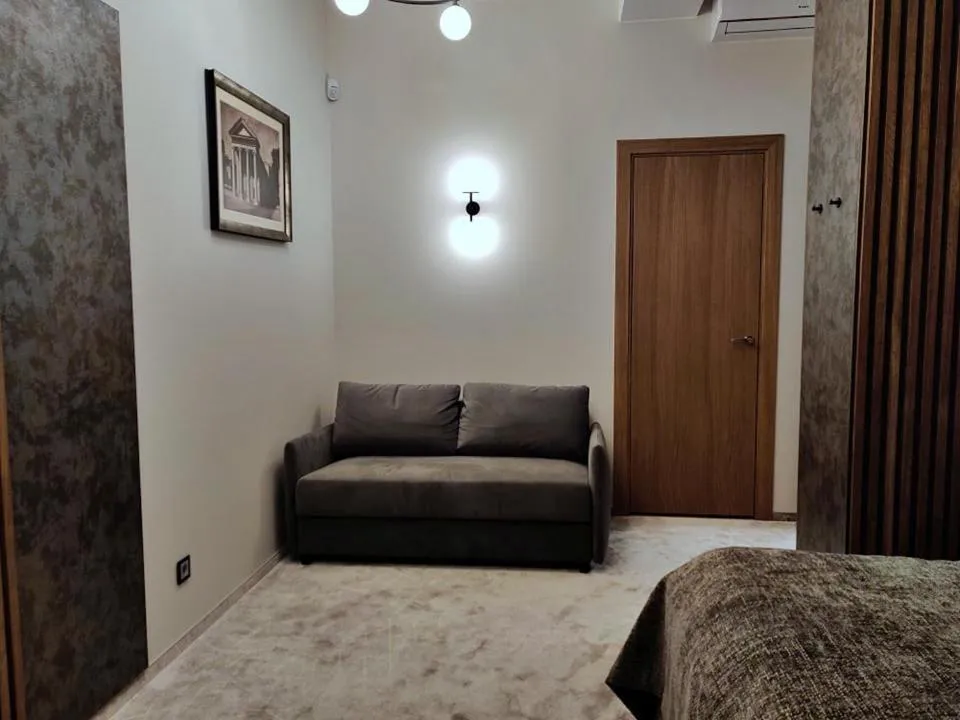 Seating area, Bed in Vvinn Hotel