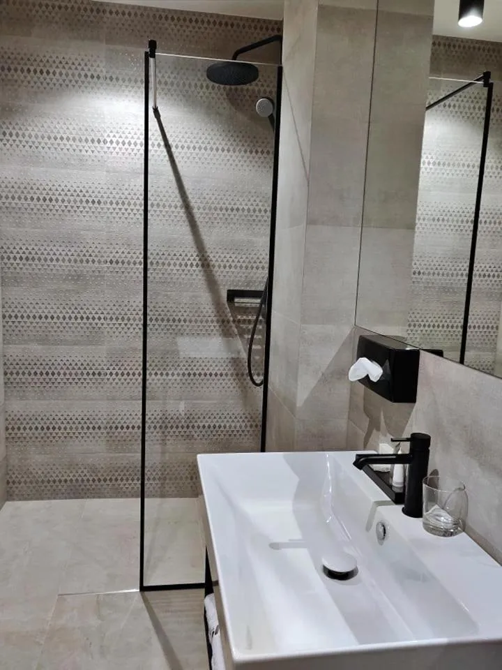 Bathroom in Vvinn Hotel