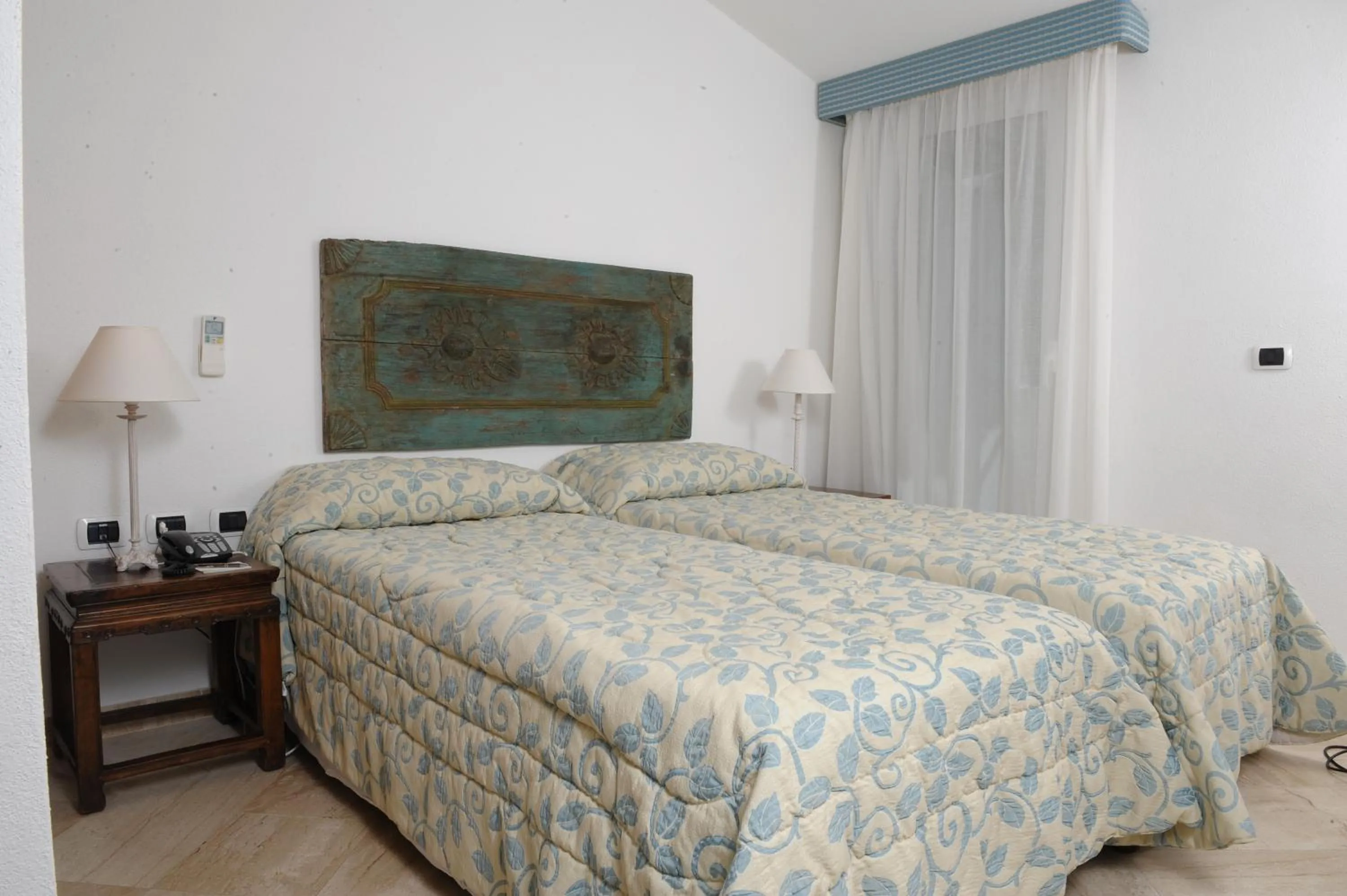 Bed in Grand Hotel Poltu Quatu