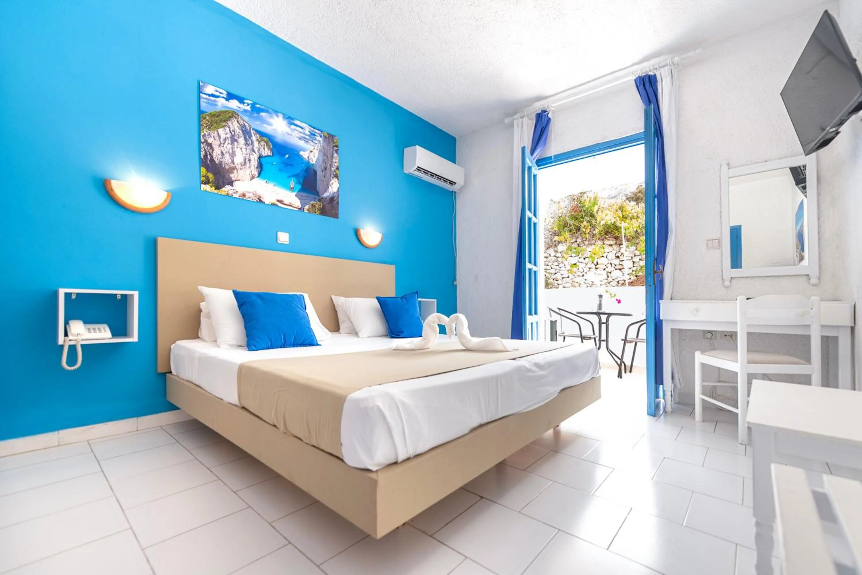 View (from property/room), Bed in Bluu Bahari Hotel