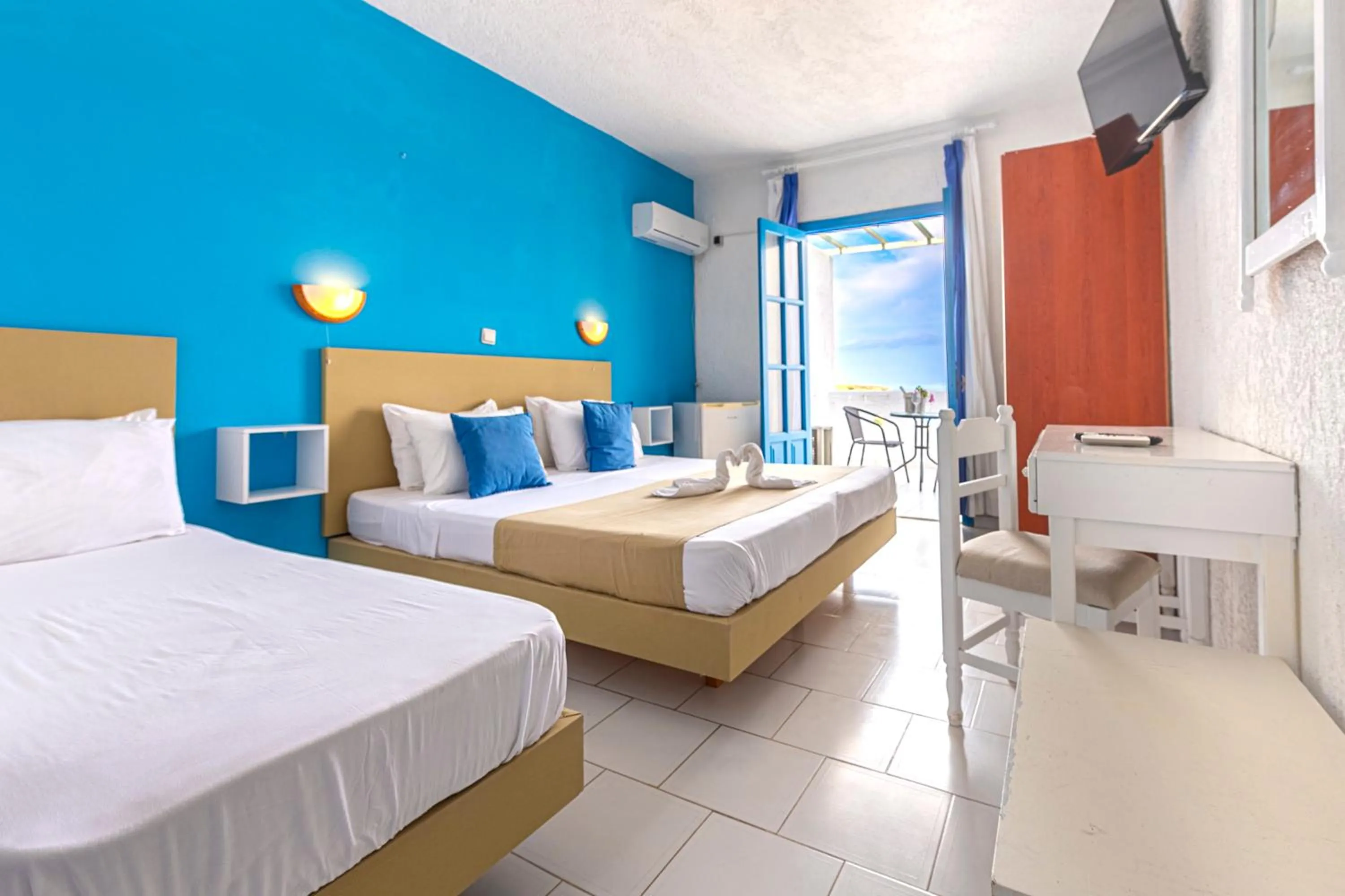 Bed in Bluu Bahari Hotel