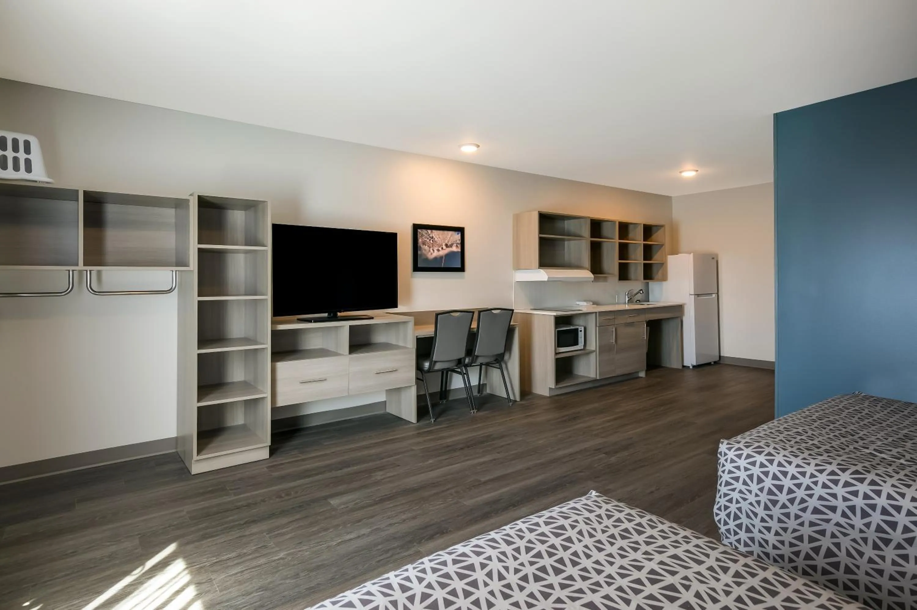 Photo of the whole room in WoodSpring Suites Concord-Charlotte Speedway