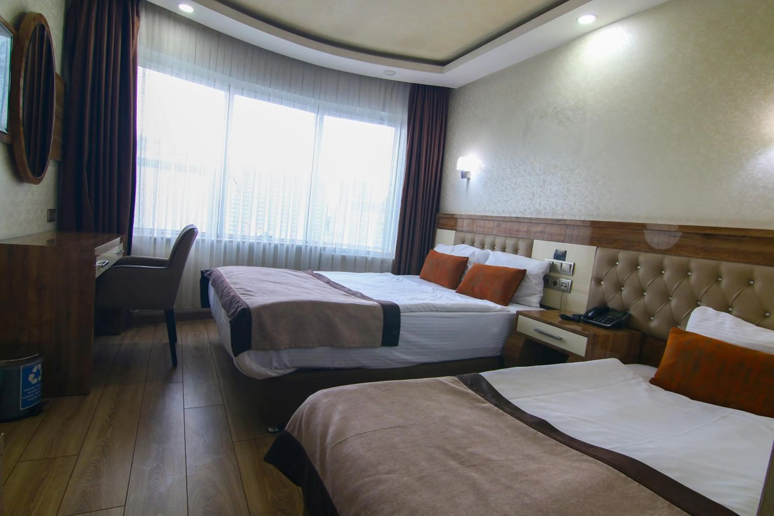 Bed in Grand Zara Hotel