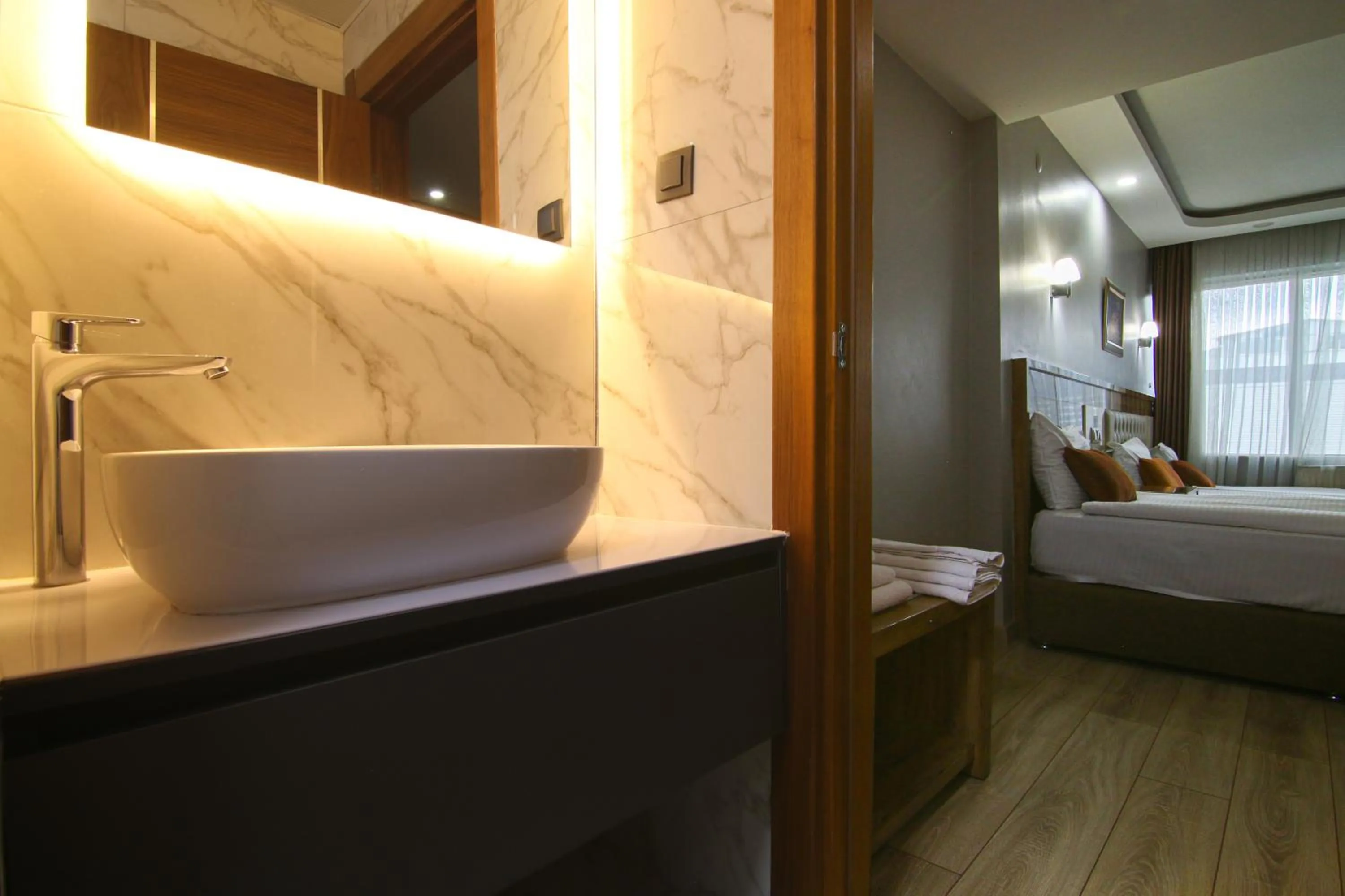 Bed in Grand Zara Hotel