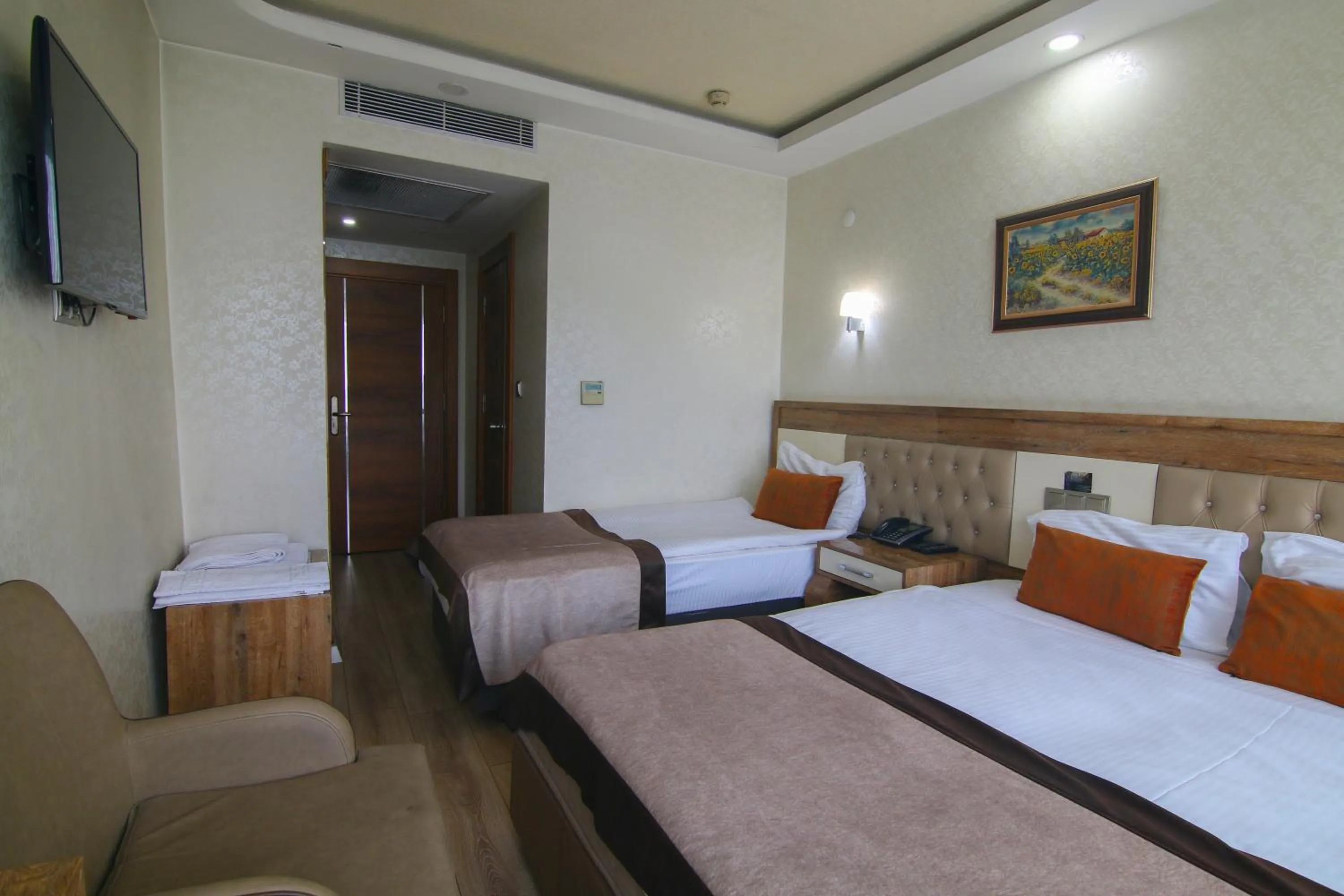 Bed in Grand Zara Hotel