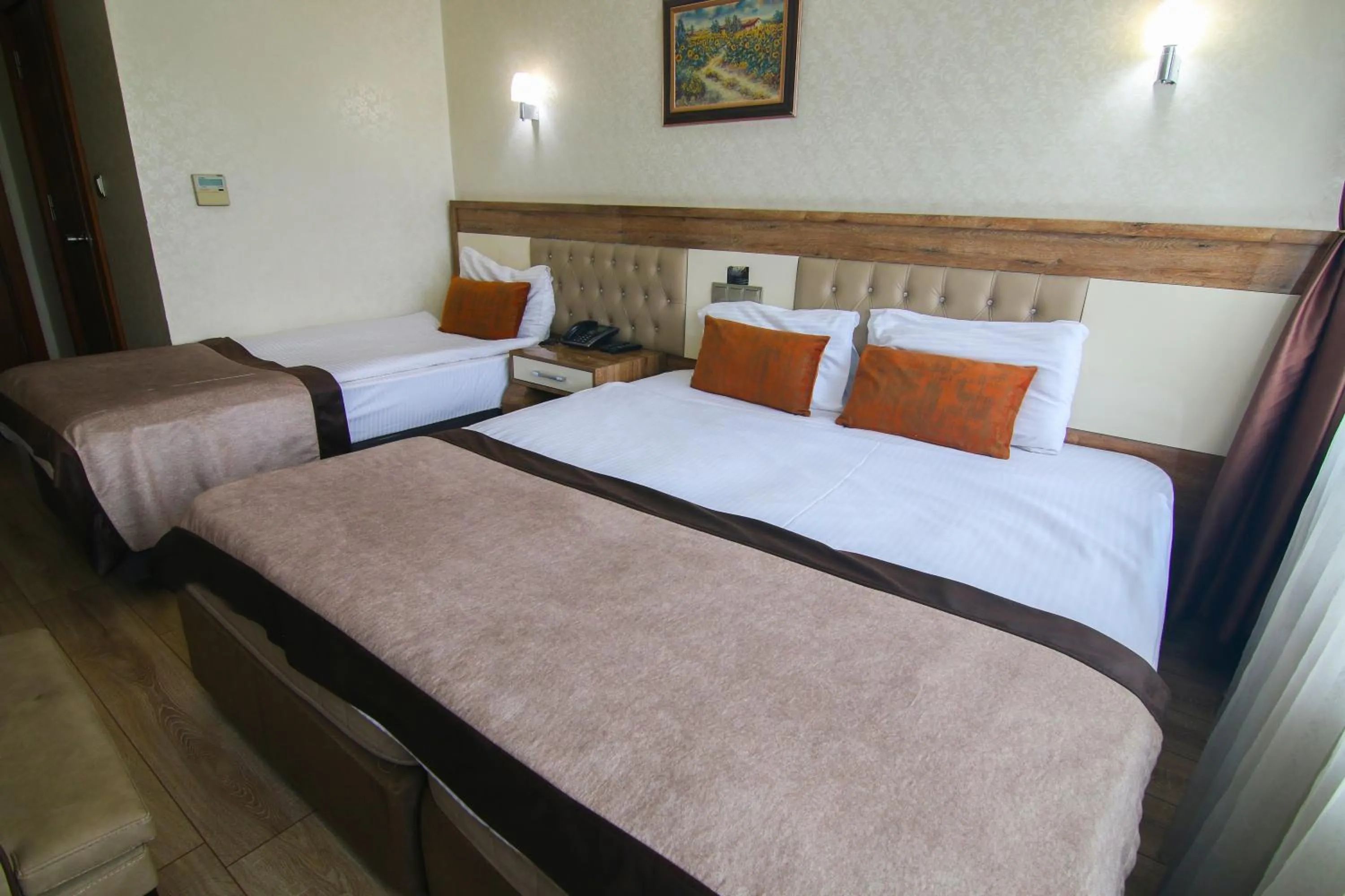 Bed in Grand Zara Hotel