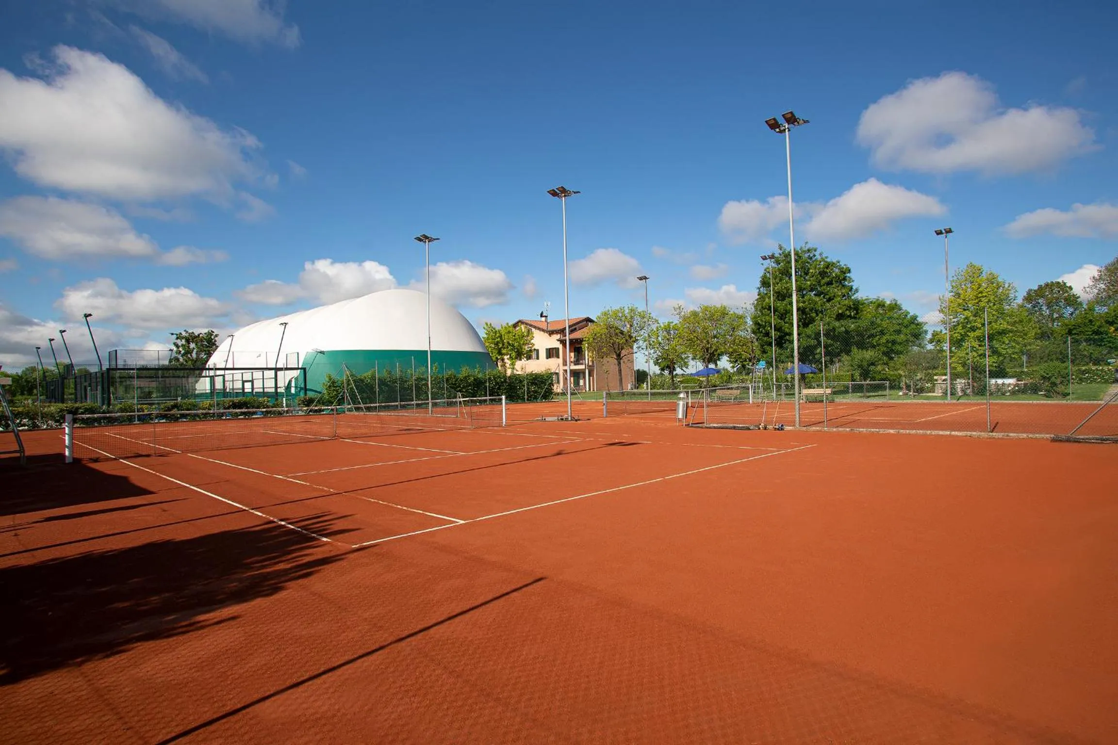 Tennis court in Ancora Sport Resort Hotel