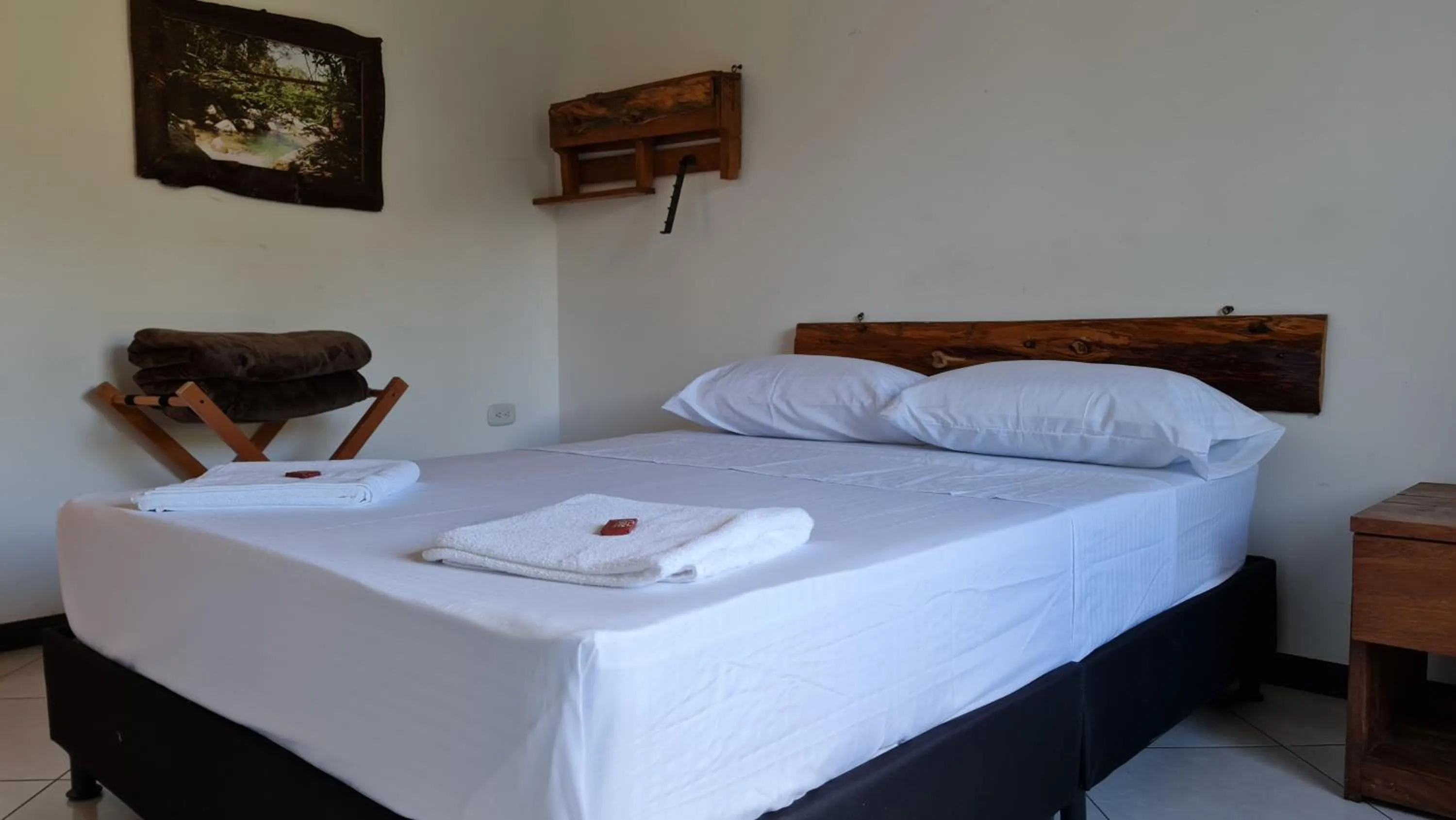 Bed in HOSTERÍA BRISAS DEL RÍO